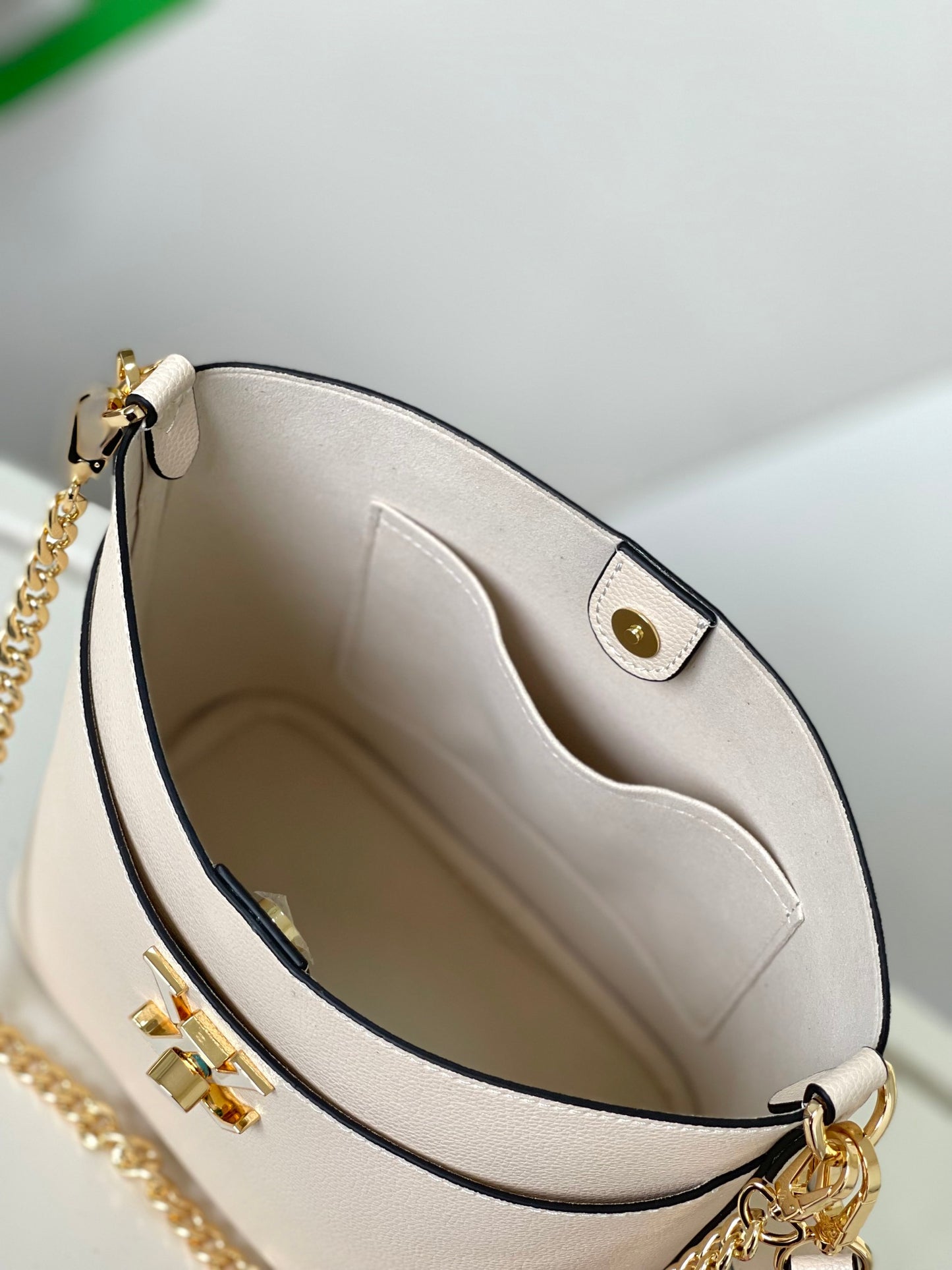 Louis Vuitton Lockme Bucket Bag in Cream Grained Leather with Gold-Tone Hardware