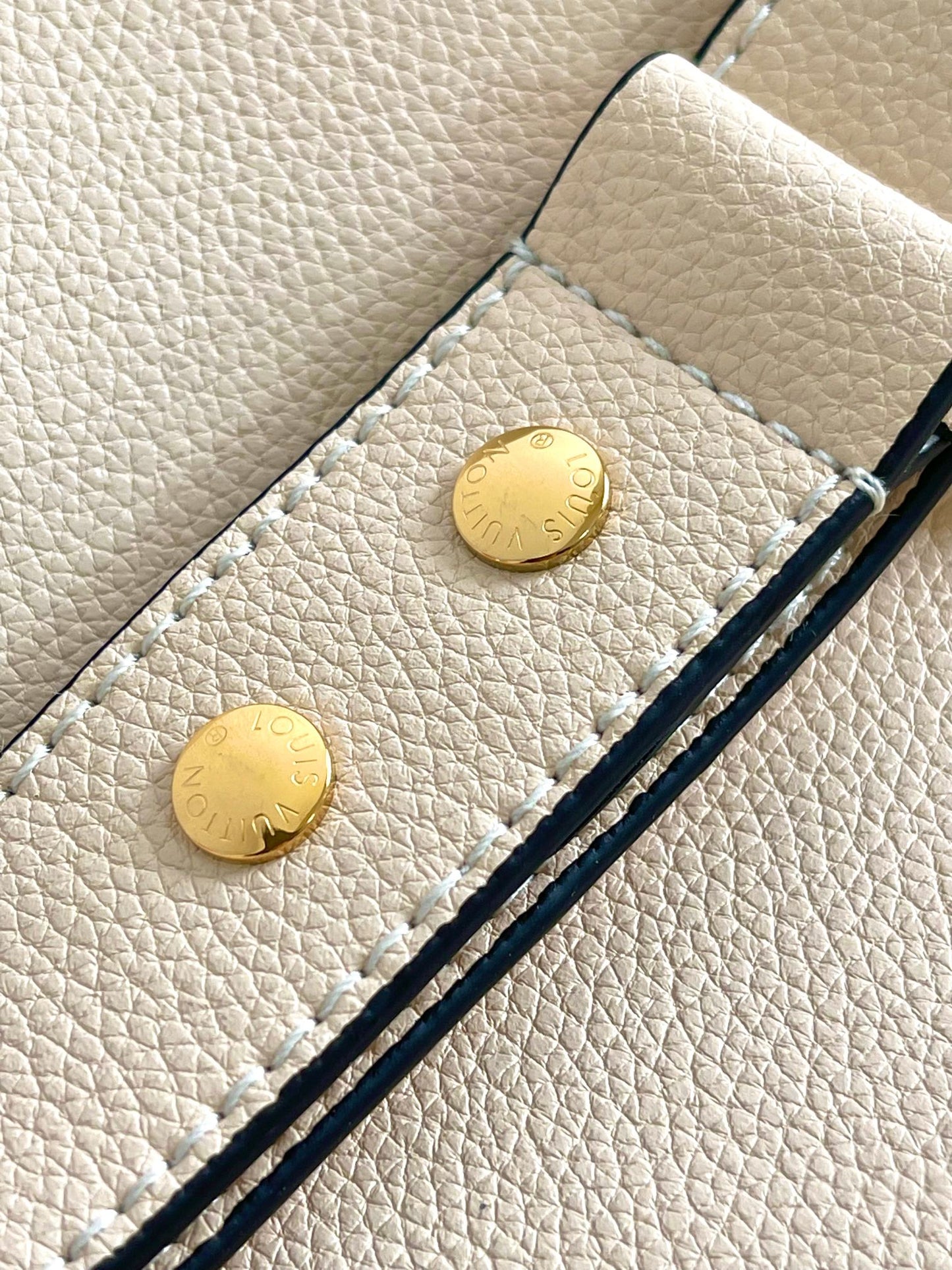 Louis Vuitton Lockme Bucket Bag in Cream Grained Leather with Gold-Tone Hardware