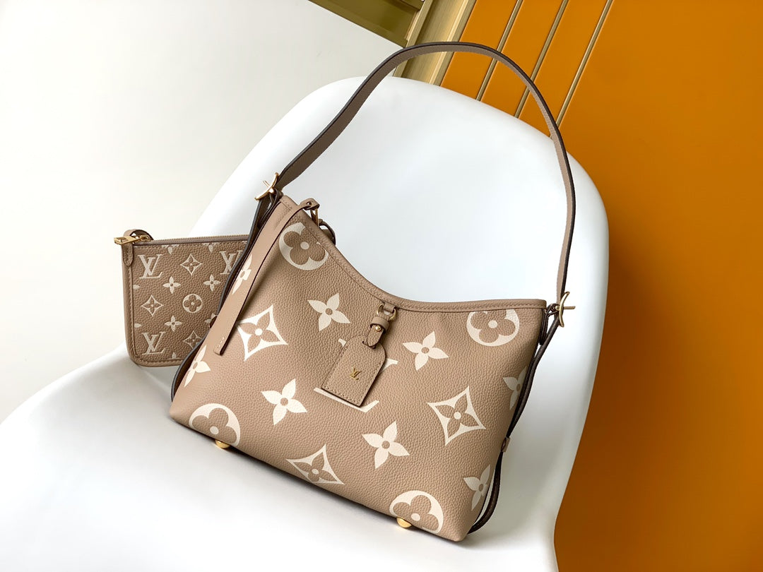 Louis Vuitton Bagatelle Monogram Empreinte Leather Handbag - Turtledove