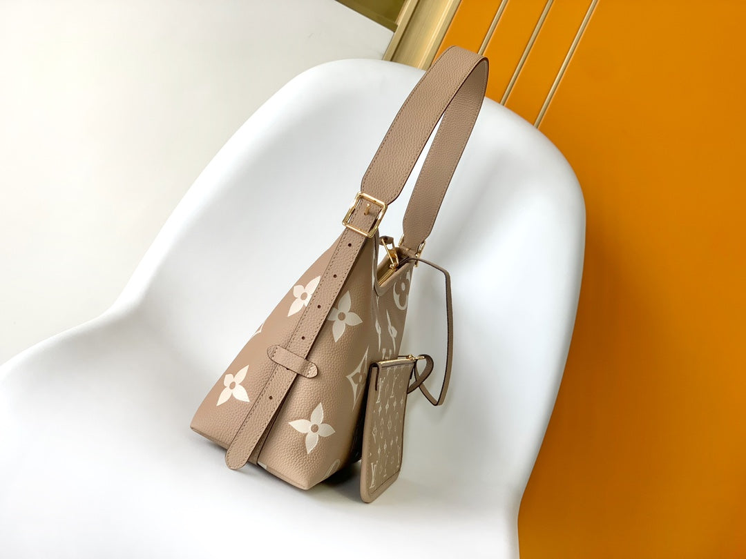 Louis Vuitton Bagatelle Monogram Empreinte Leather Handbag - Turtledove