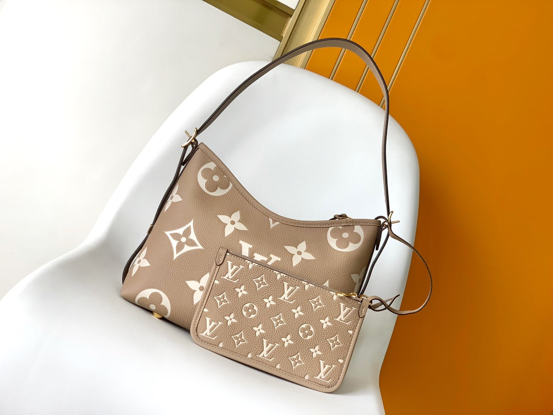 Louis Vuitton Bagatelle Monogram Empreinte Leather Handbag - Turtledove