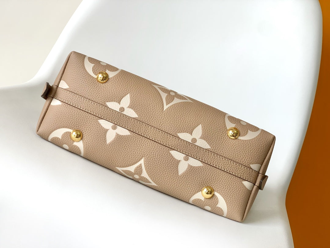 Louis Vuitton Bagatelle Monogram Empreinte Leather Handbag - Turtledove
