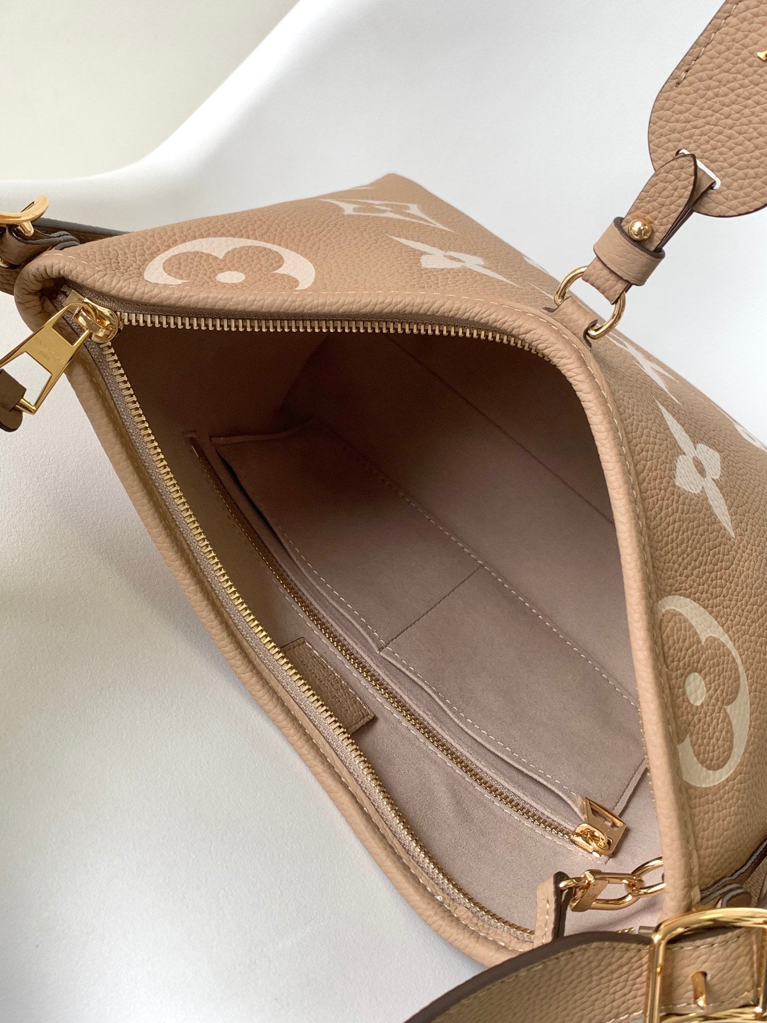 Louis Vuitton Bagatelle Monogram Empreinte Leather Handbag - Turtledove