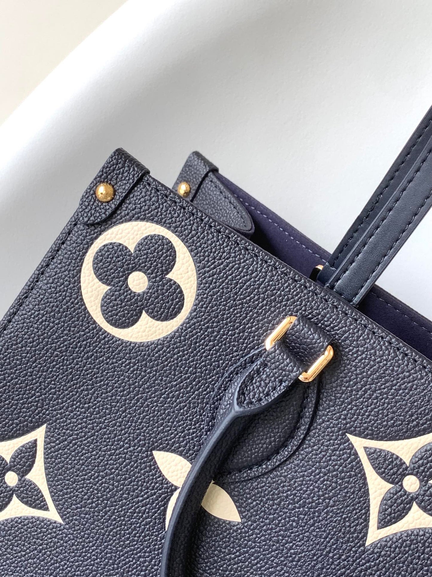Louis Vuitton OnTheGo MM Monogram Empreinte Navy Blue Leather Tote Bag