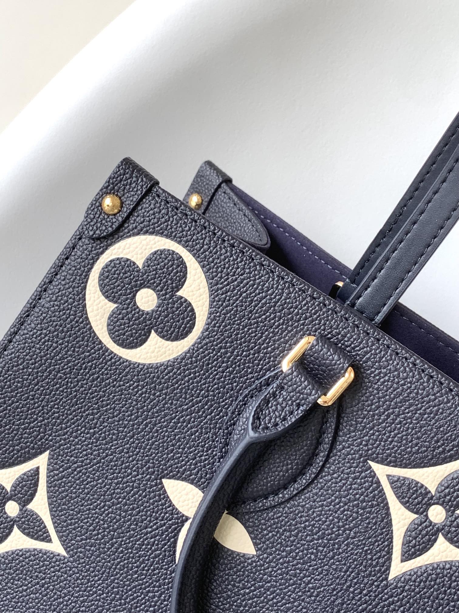 Louis Vuitton OnTheGo MM Monogram Empreinte Navy Blue Leather Tote Bag