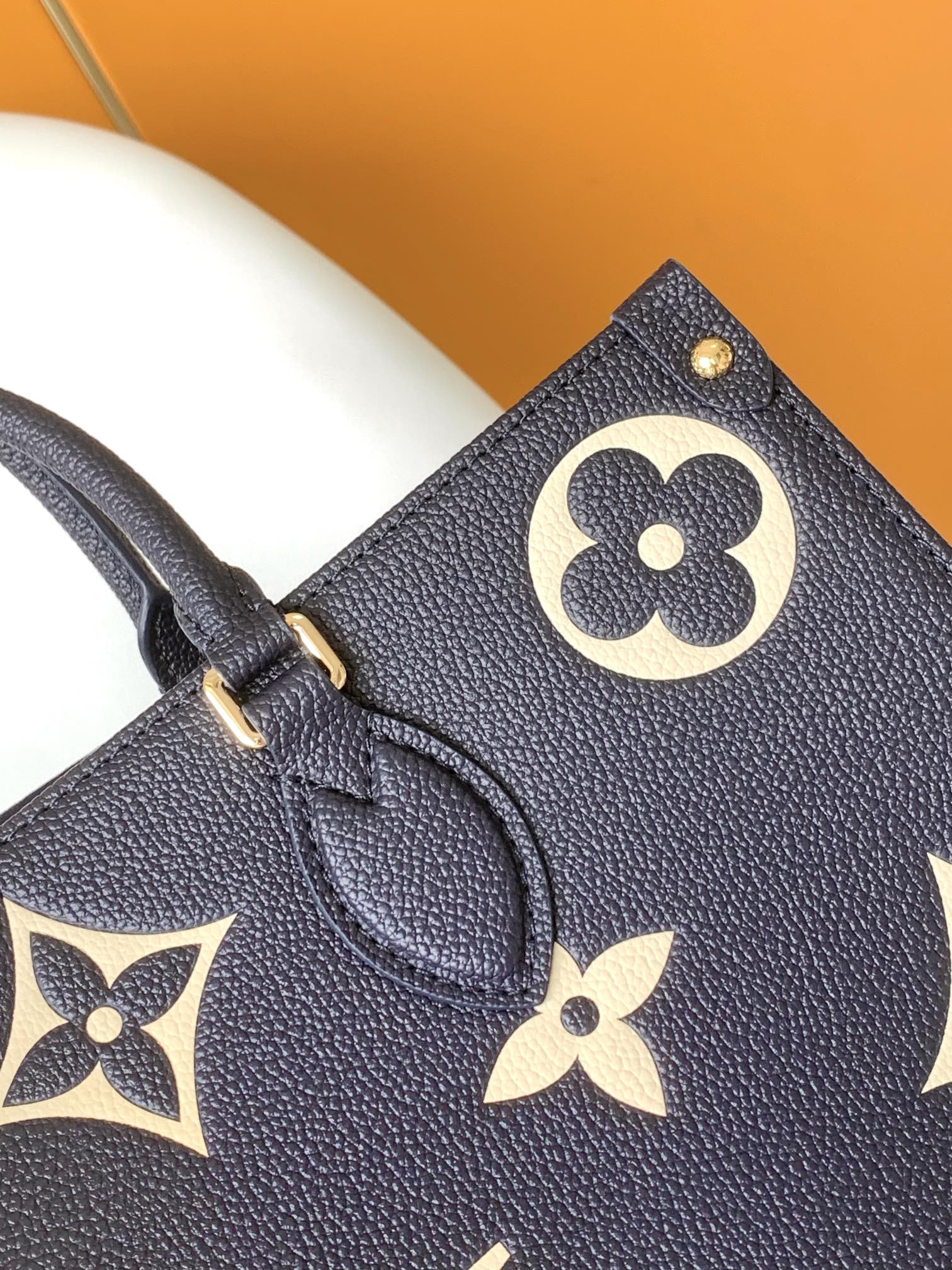 Louis Vuitton OnTheGo MM Monogram Empreinte Navy Blue Leather Tote Bag