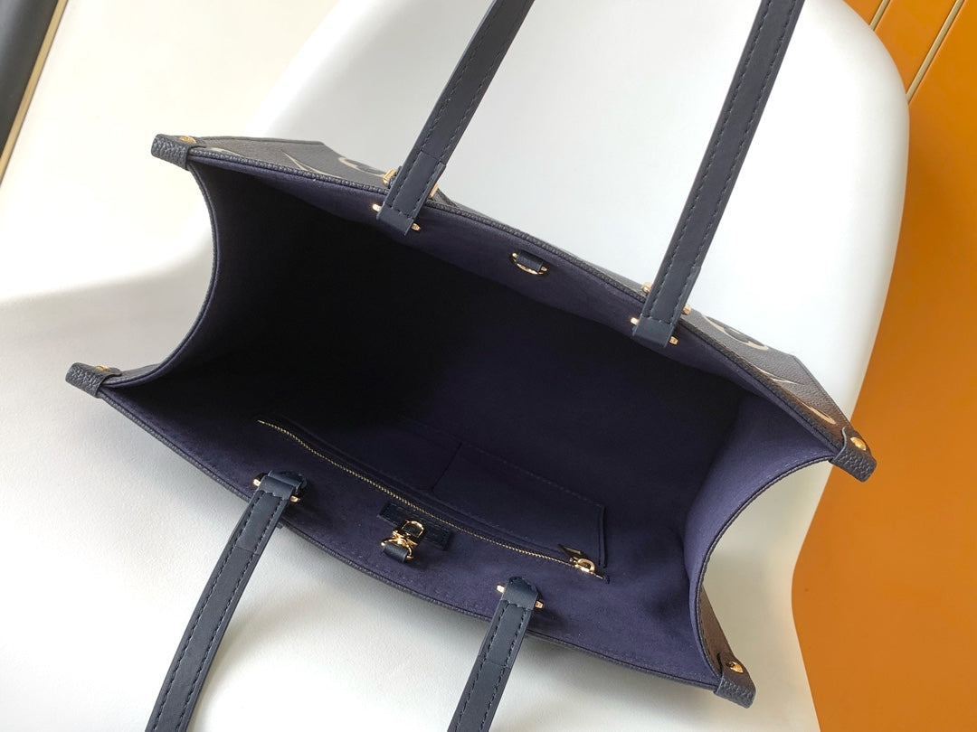 Louis Vuitton OnTheGo MM Monogram Empreinte Navy Blue Leather Tote Bag