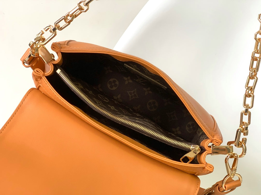 Women's Tan Leather Crossbody Handbag with Gold Chain Strap and Logo Buckle