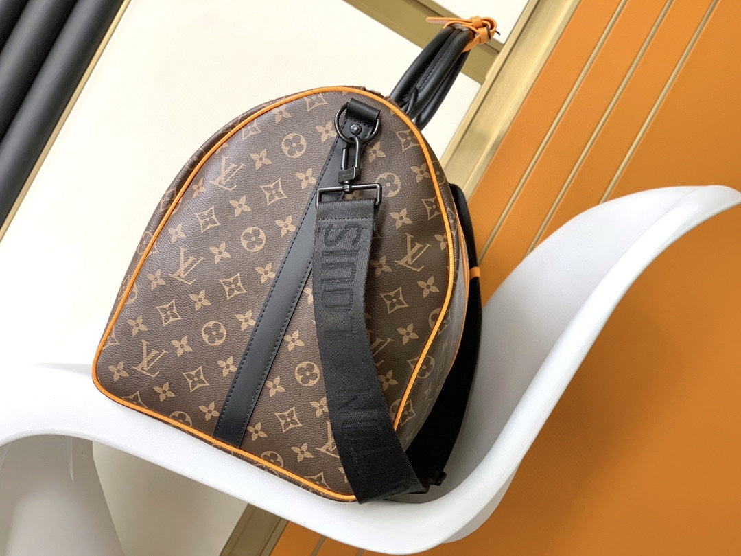 Louis Vuitton Keepall Bandoulière Monogram Canvas with Orange Trim Travel Bag