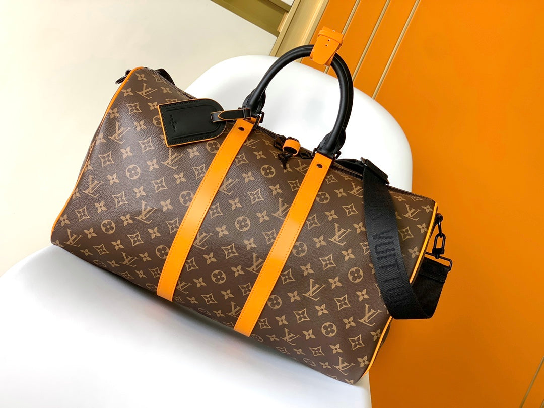 Louis Vuitton Keepall Bandoulière 50 Monogram Macassar with Orange Trim