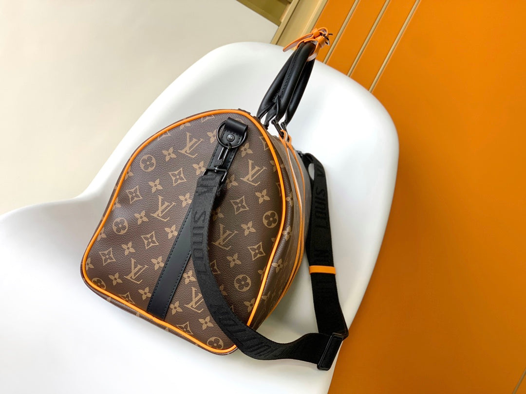 Louis Vuitton Keepall Bandoulière 50 Monogram Macassar with Orange Trim