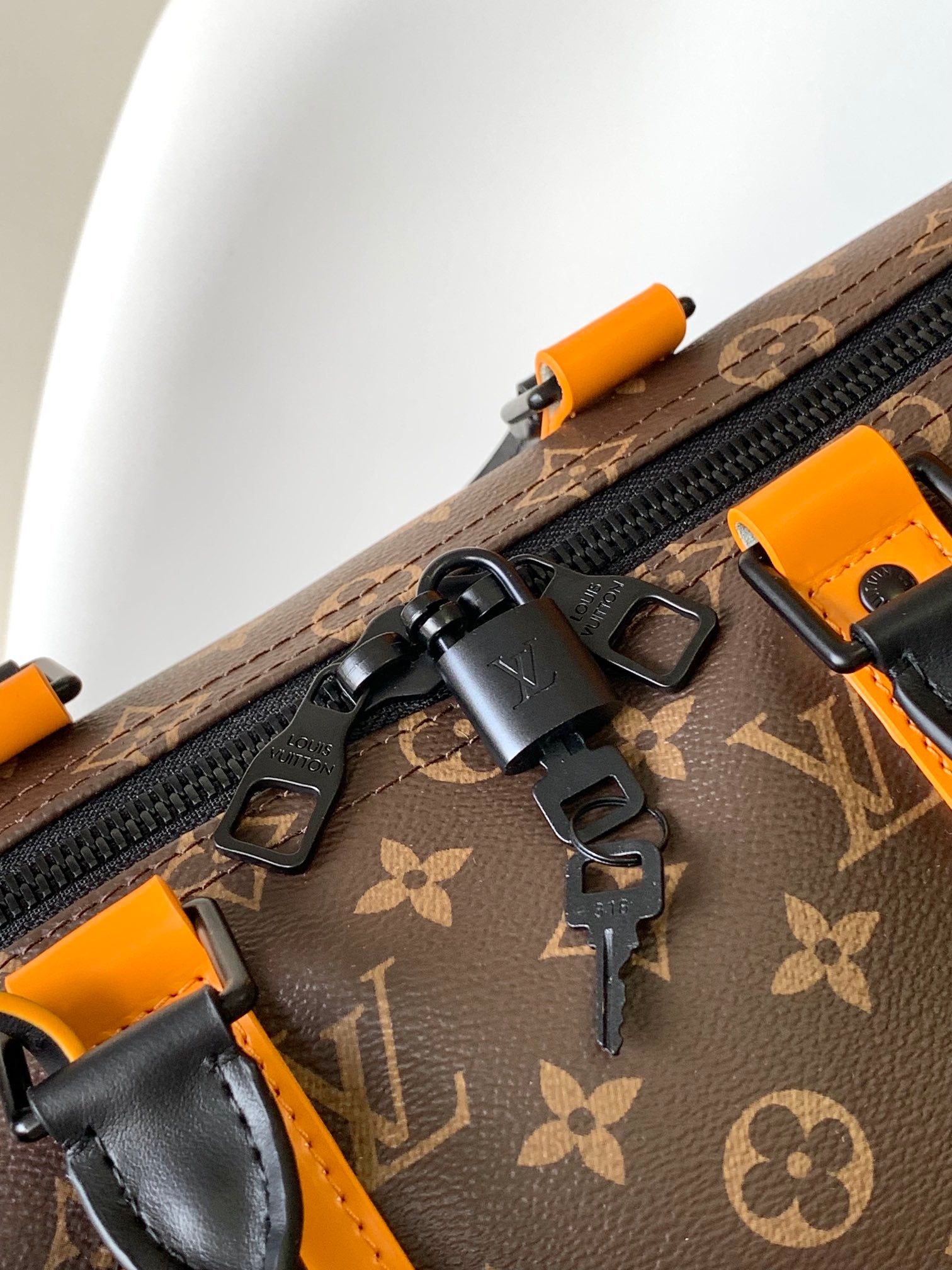 Louis Vuitton Keepall Bandoulière 50 Monogram Macassar with Orange Trim