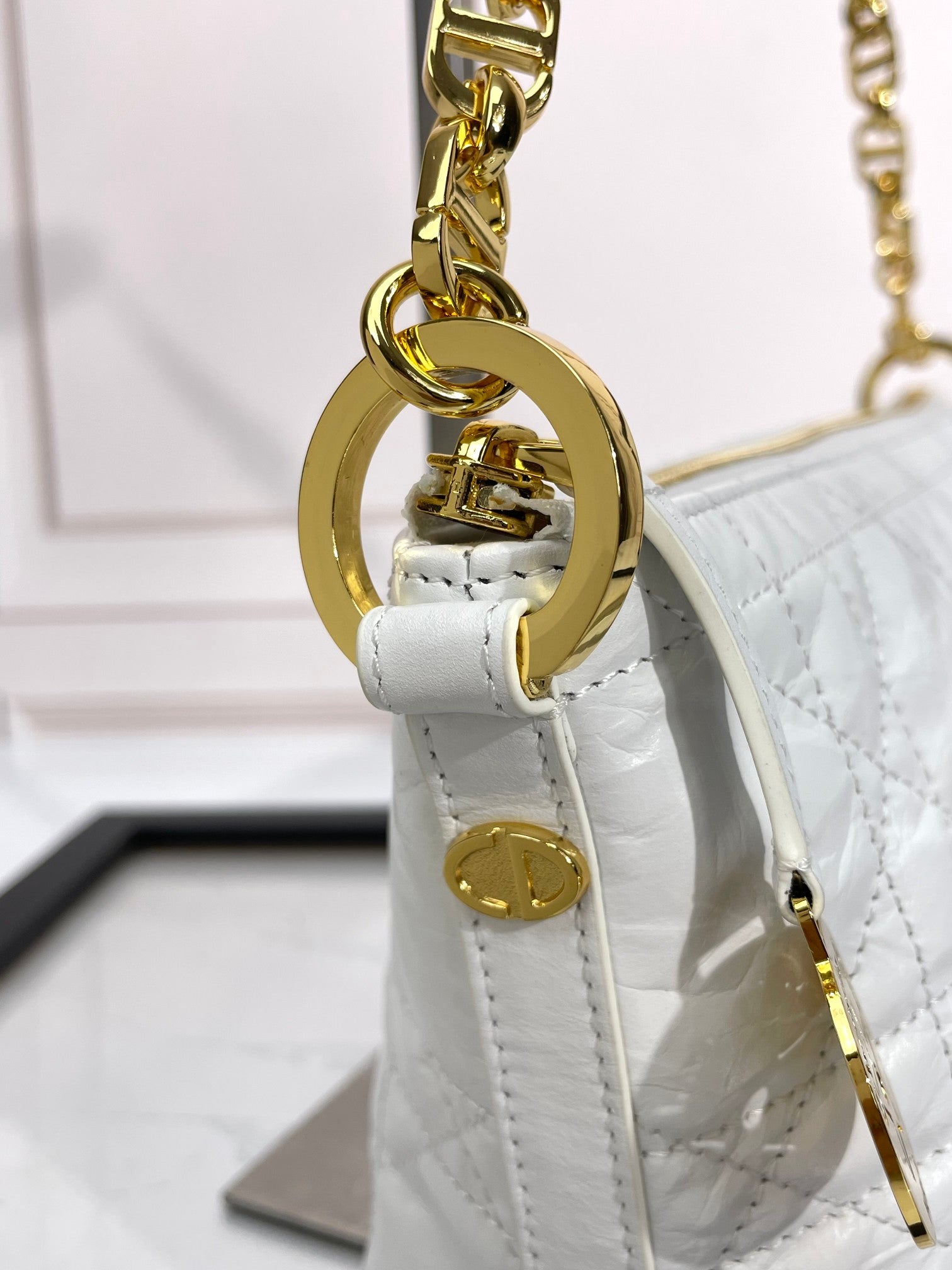 Elegant White Quilted Shoulder Bag with Gold-Tone Chain Strap