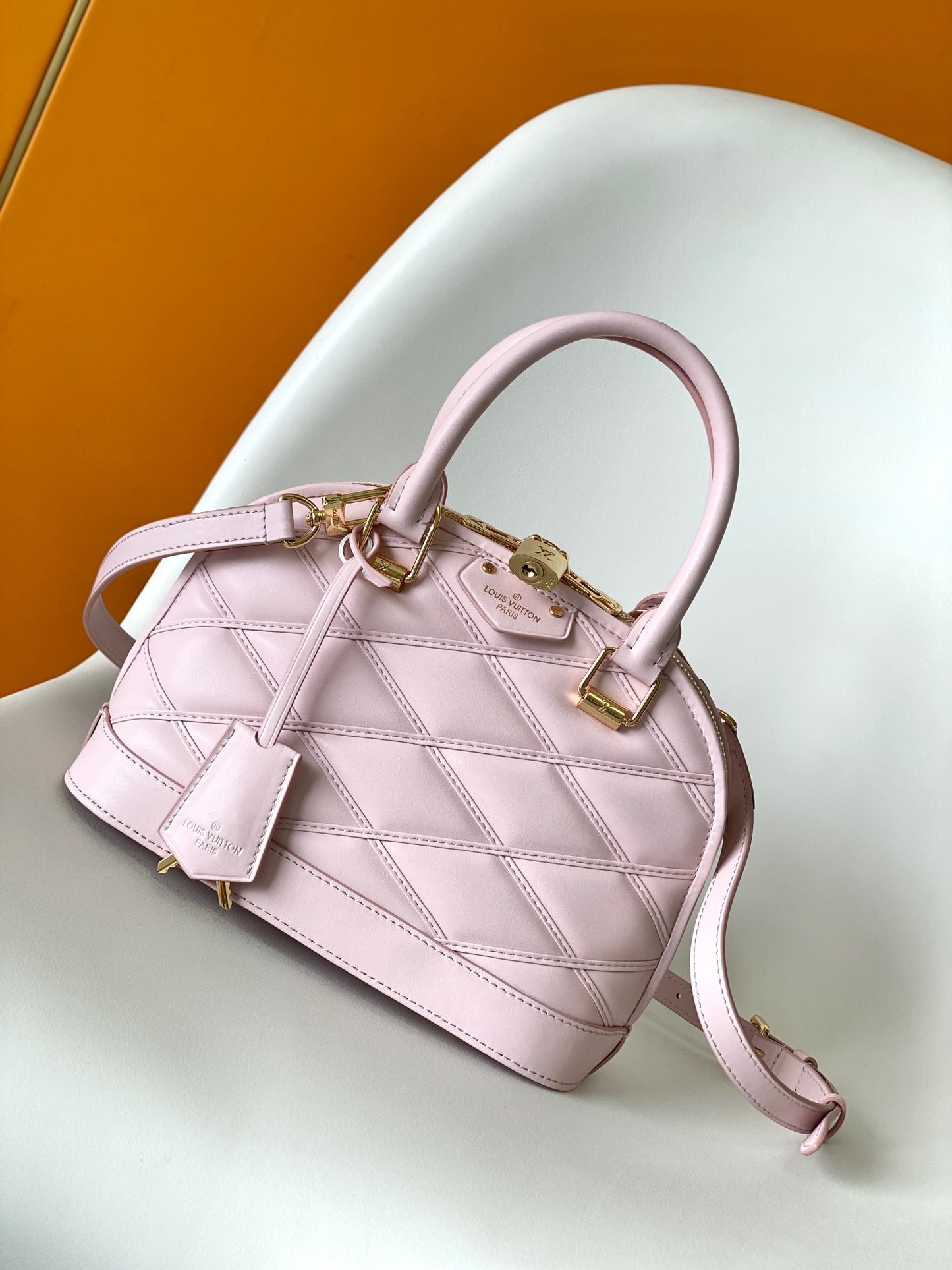 Luxury Quilted Pink Leather Dome Handbag with Gold-Tone Hardware