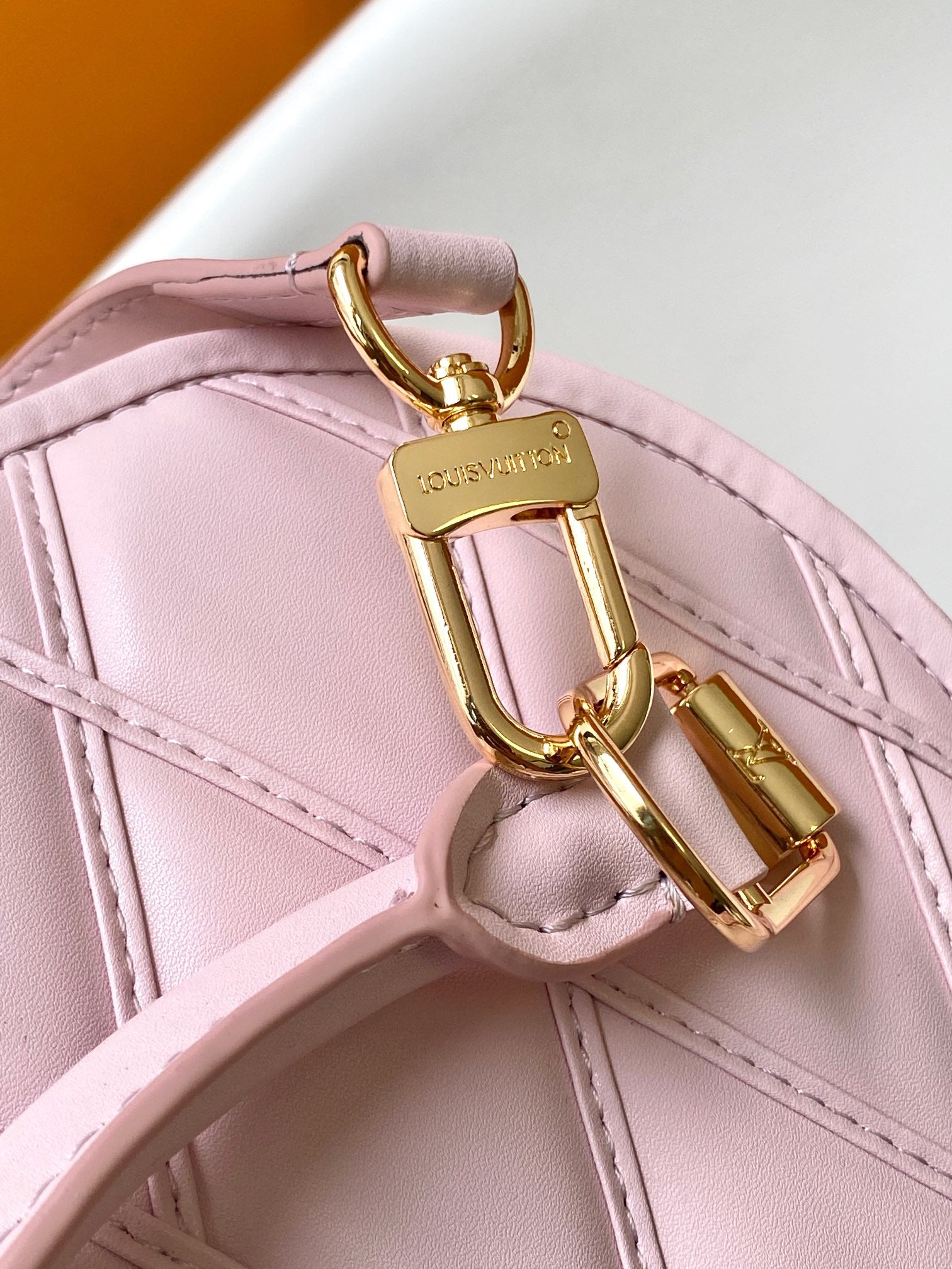 Luxury Quilted Pink Leather Dome Handbag with Gold-Tone Hardware