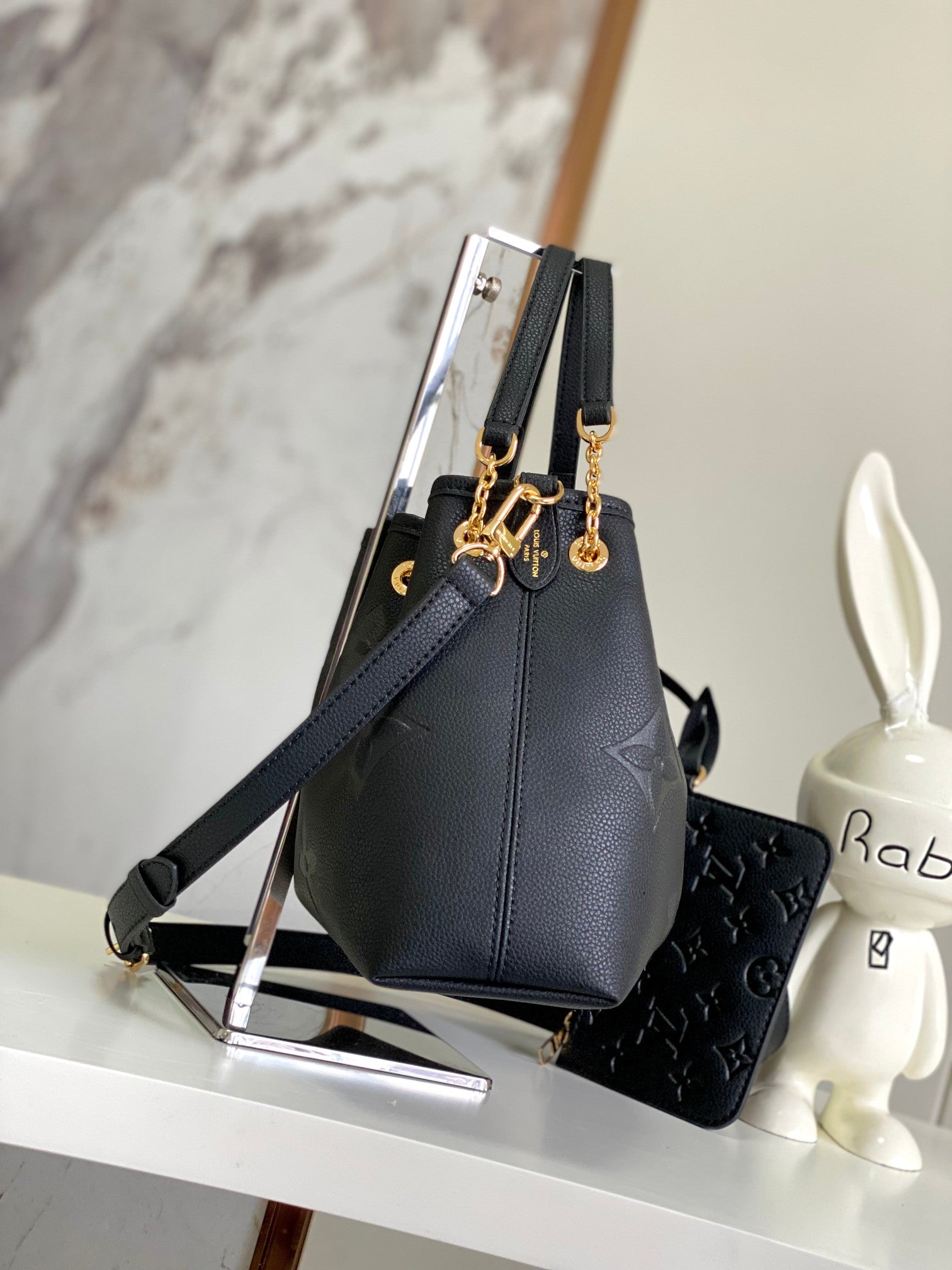 Louis Vuitton Elegant Black Embossed Leather Drawstring Shoulder Bag