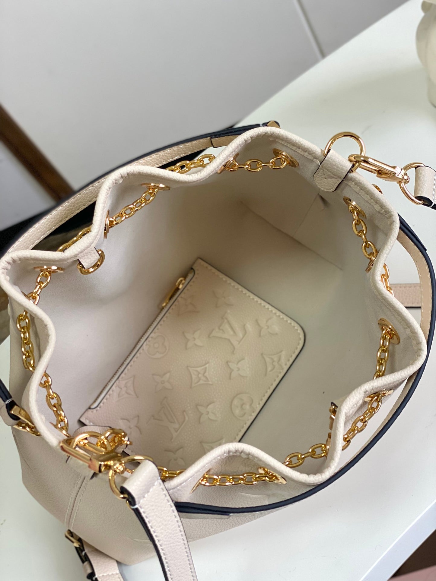 Louis Vuitton Muria Bucket Bag Monogram Mahina Perforated Leather Cream