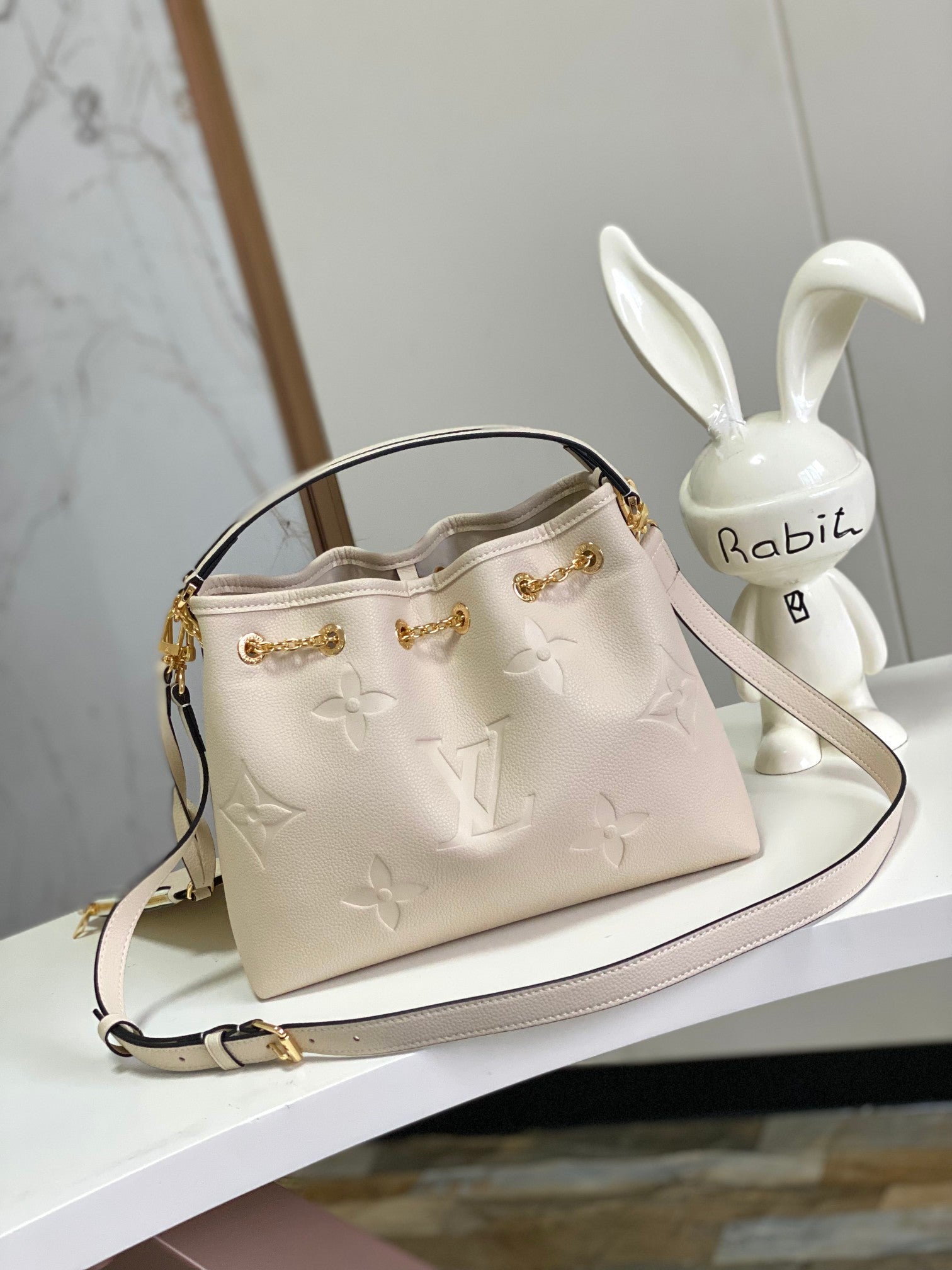 Louis Vuitton Muria Bucket Bag Monogram Mahina Perforated Leather Cream