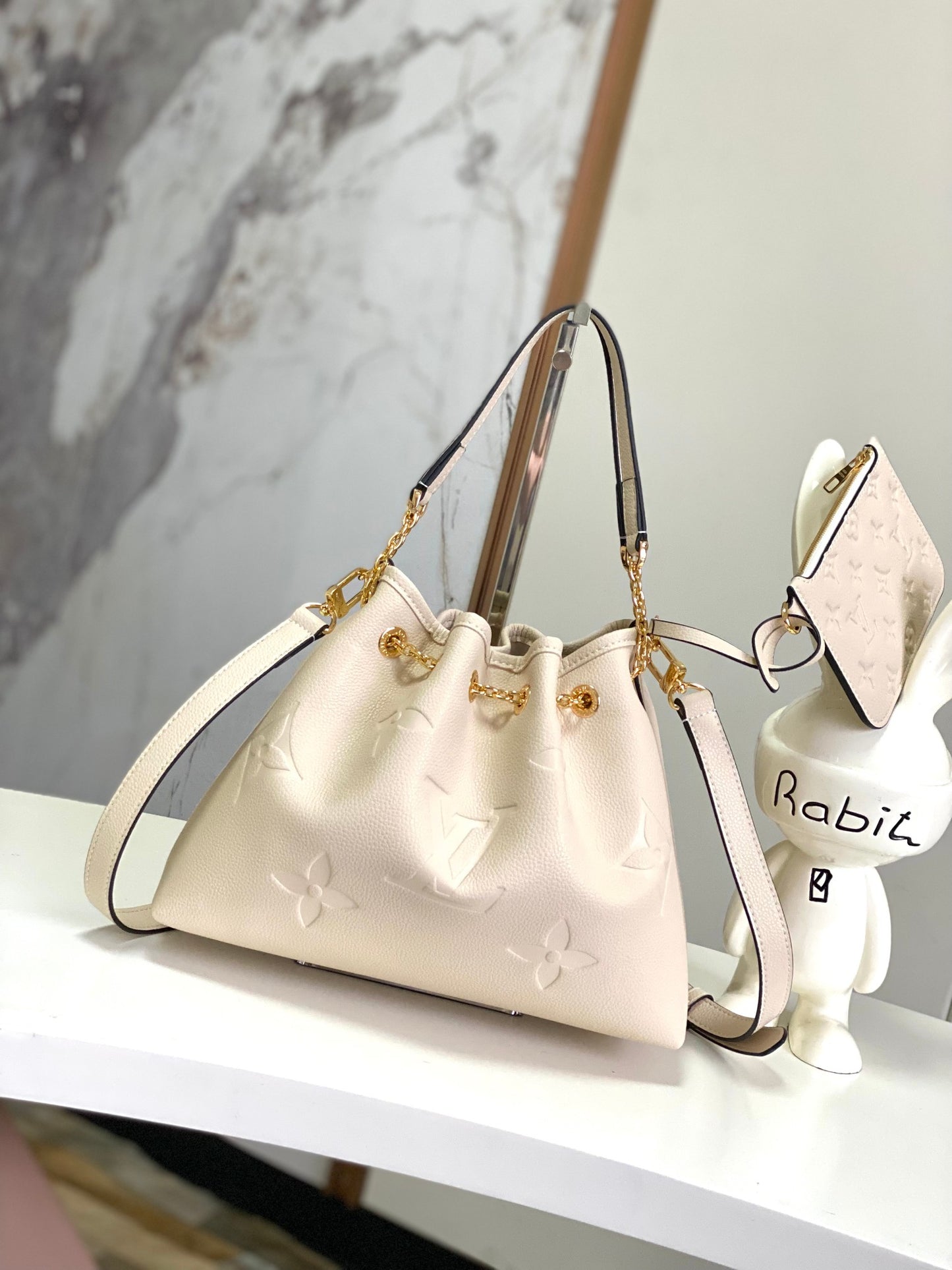 Louis Vuitton Muria Bucket Bag Monogram Mahina Perforated Leather Cream