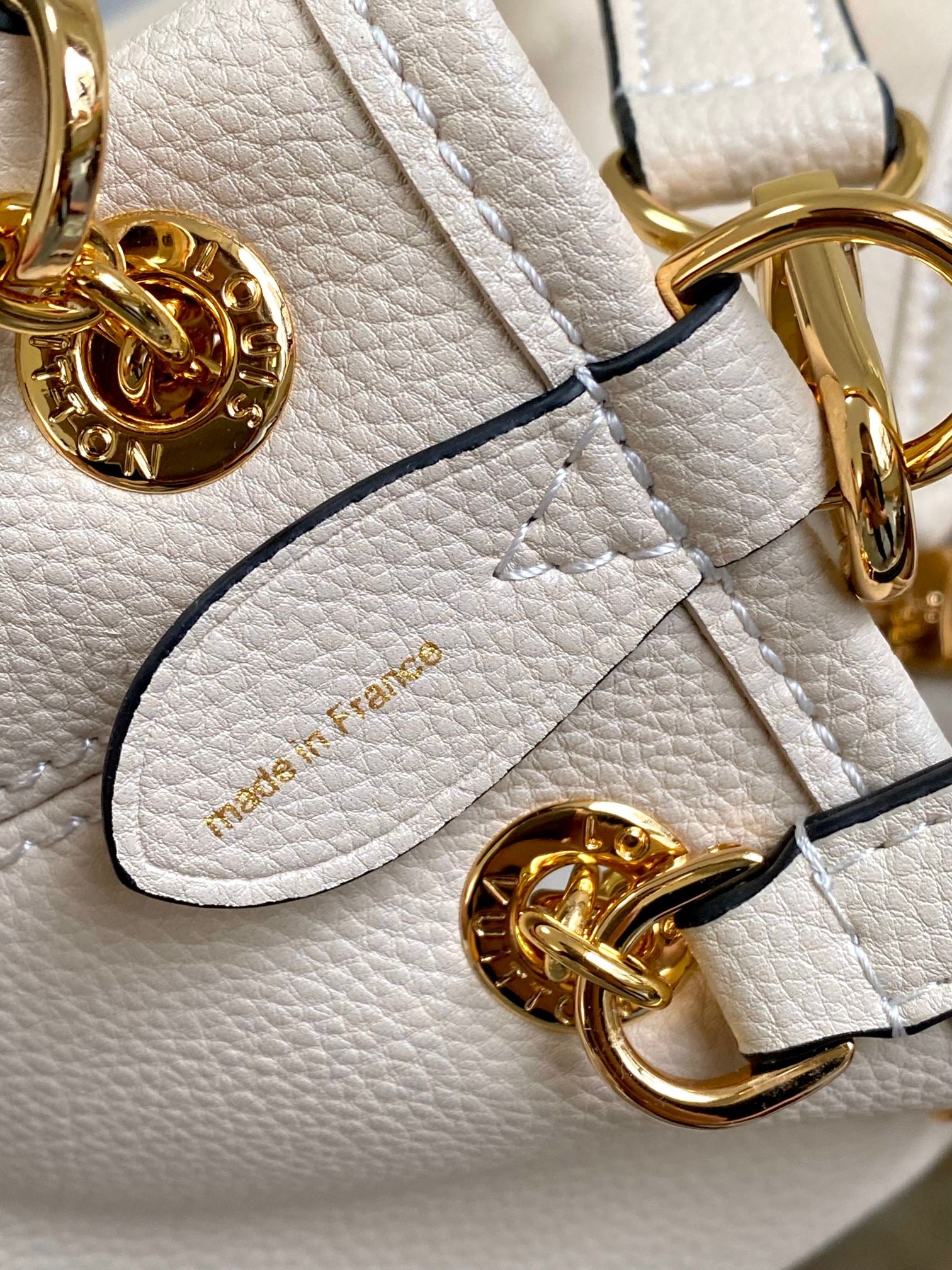 Louis Vuitton Muria Bucket Bag Monogram Mahina Perforated Leather Cream