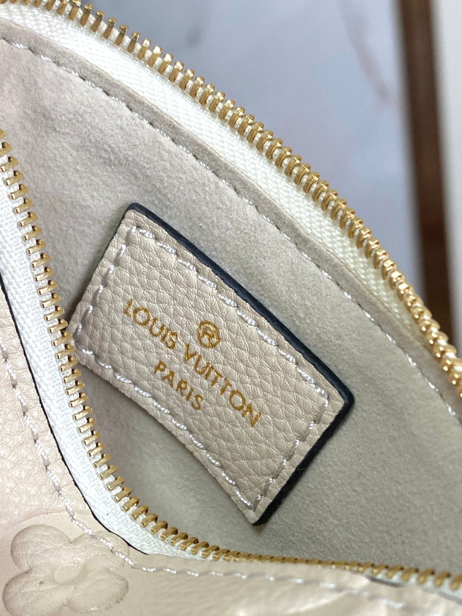 Louis Vuitton Muria Bucket Bag Monogram Mahina Perforated Leather Cream