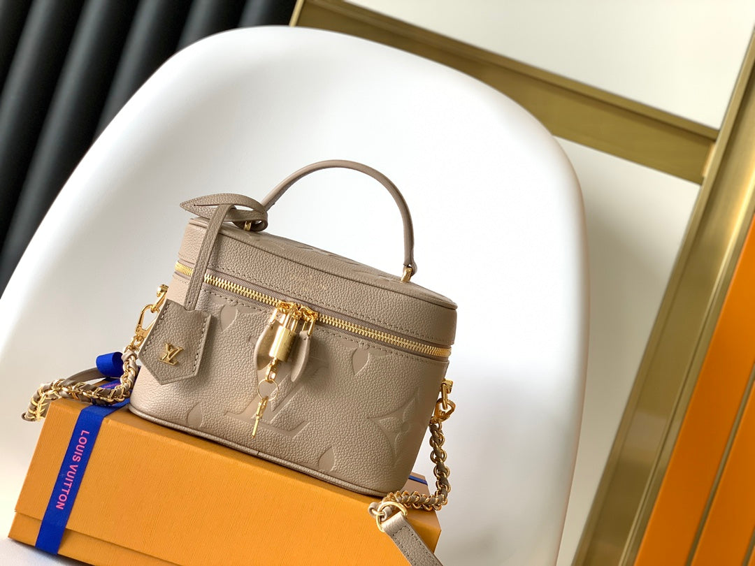 Louis Vuitton Vanity PM Monogram Empreinte Leather Bag - Tourterelle