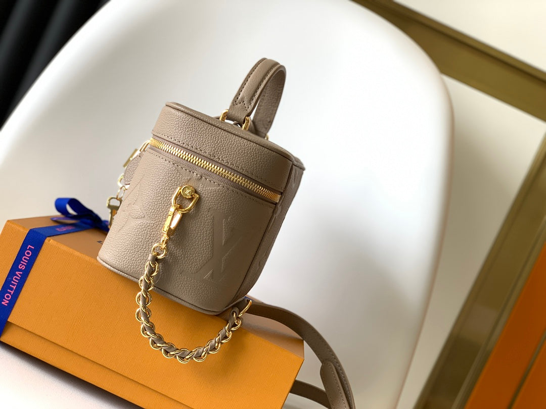 Louis Vuitton Vanity PM Monogram Empreinte Leather Bag - Tourterelle