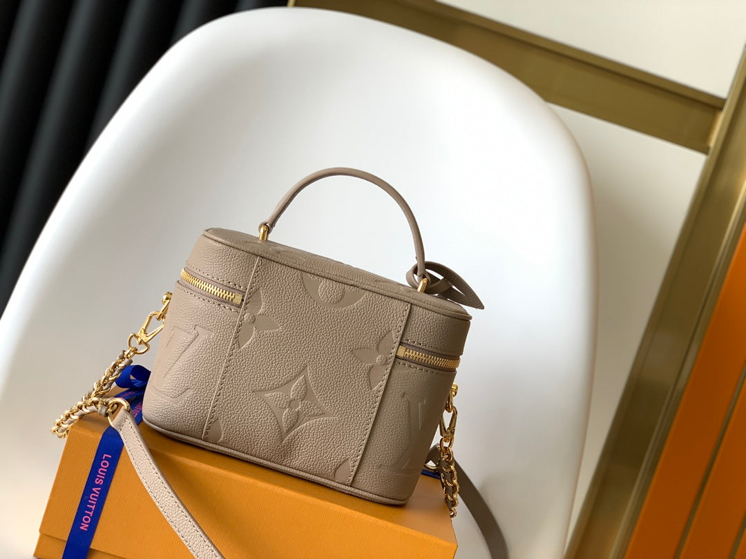 Louis Vuitton Vanity PM Monogram Empreinte Leather Bag - Tourterelle