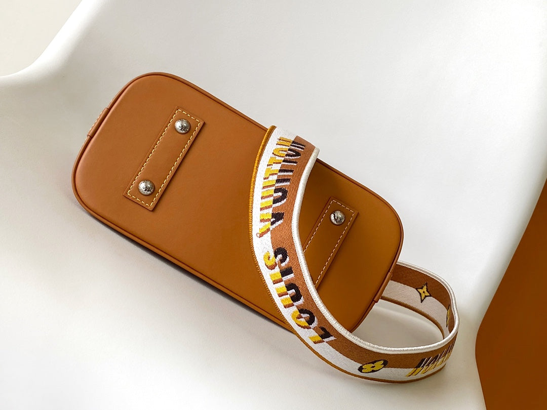 Louis Vuitton Alma BB Epi Leather Handbag with Jacquard Strap - Tan