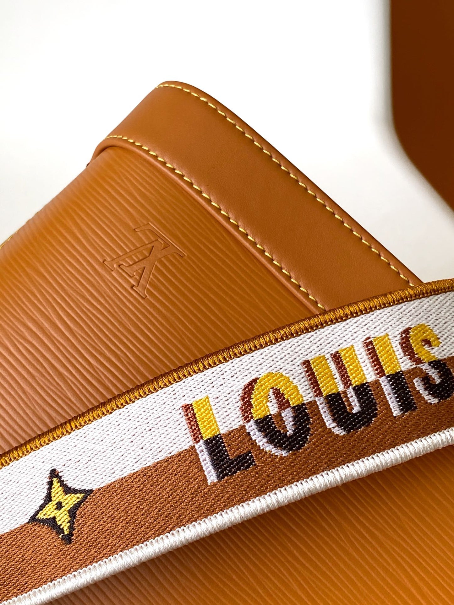 Louis Vuitton Alma BB Epi Leather Handbag with Jacquard Strap - Tan