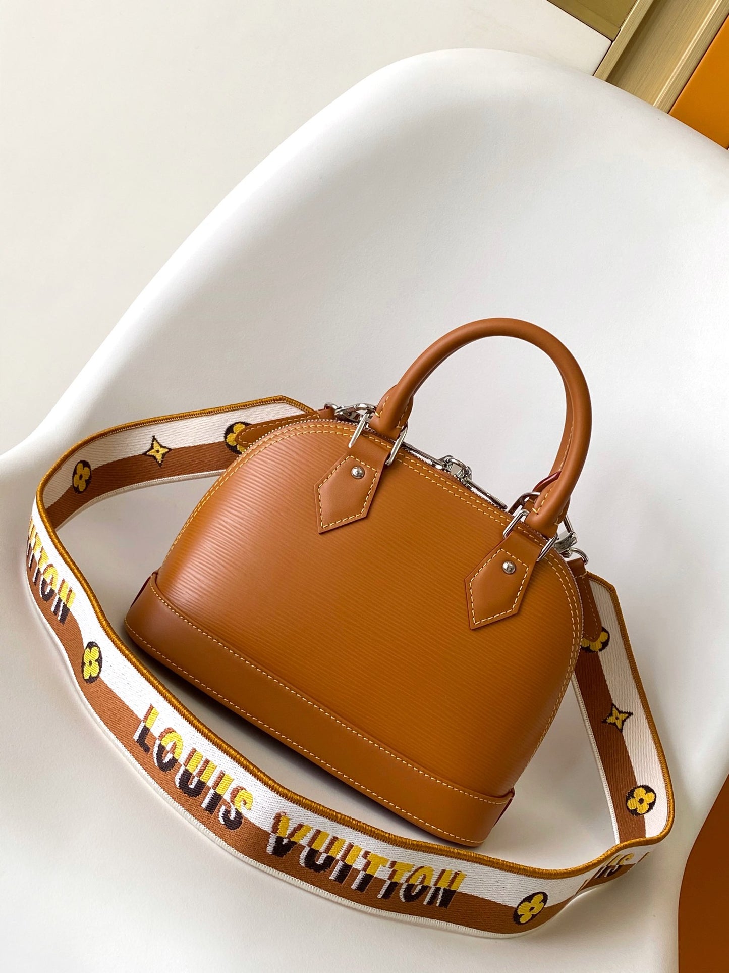 Louis Vuitton Alma BB Epi Leather Handbag with Jacquard Strap - Tan