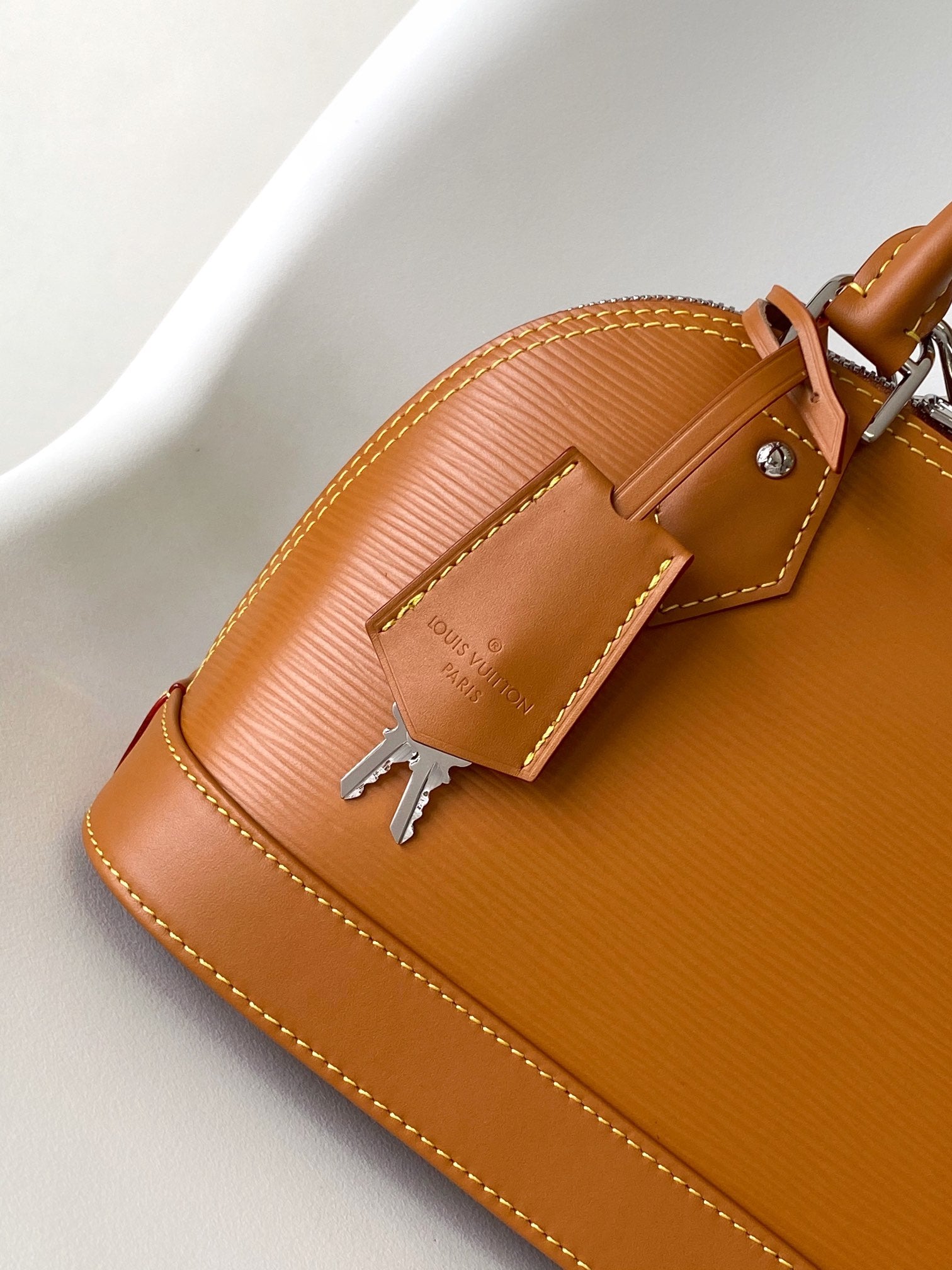 Louis Vuitton Alma BB Epi Leather Handbag with Jacquard Strap - Tan