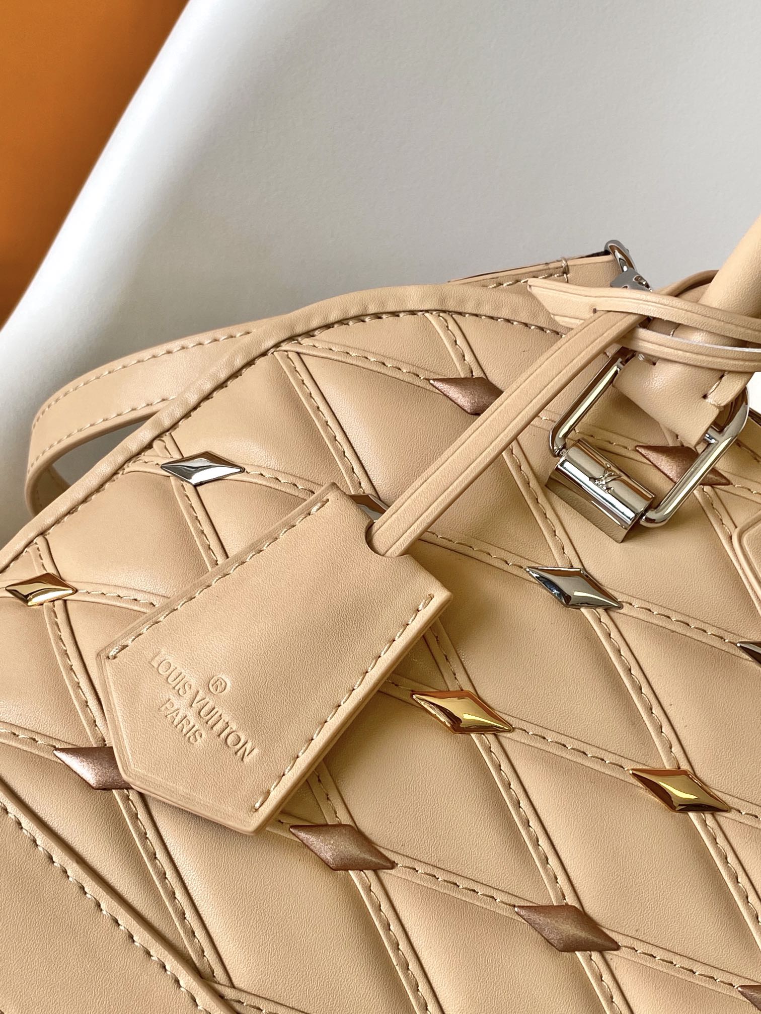 Quilted Leather Dome Top Handle Bag with Studs - Beige
