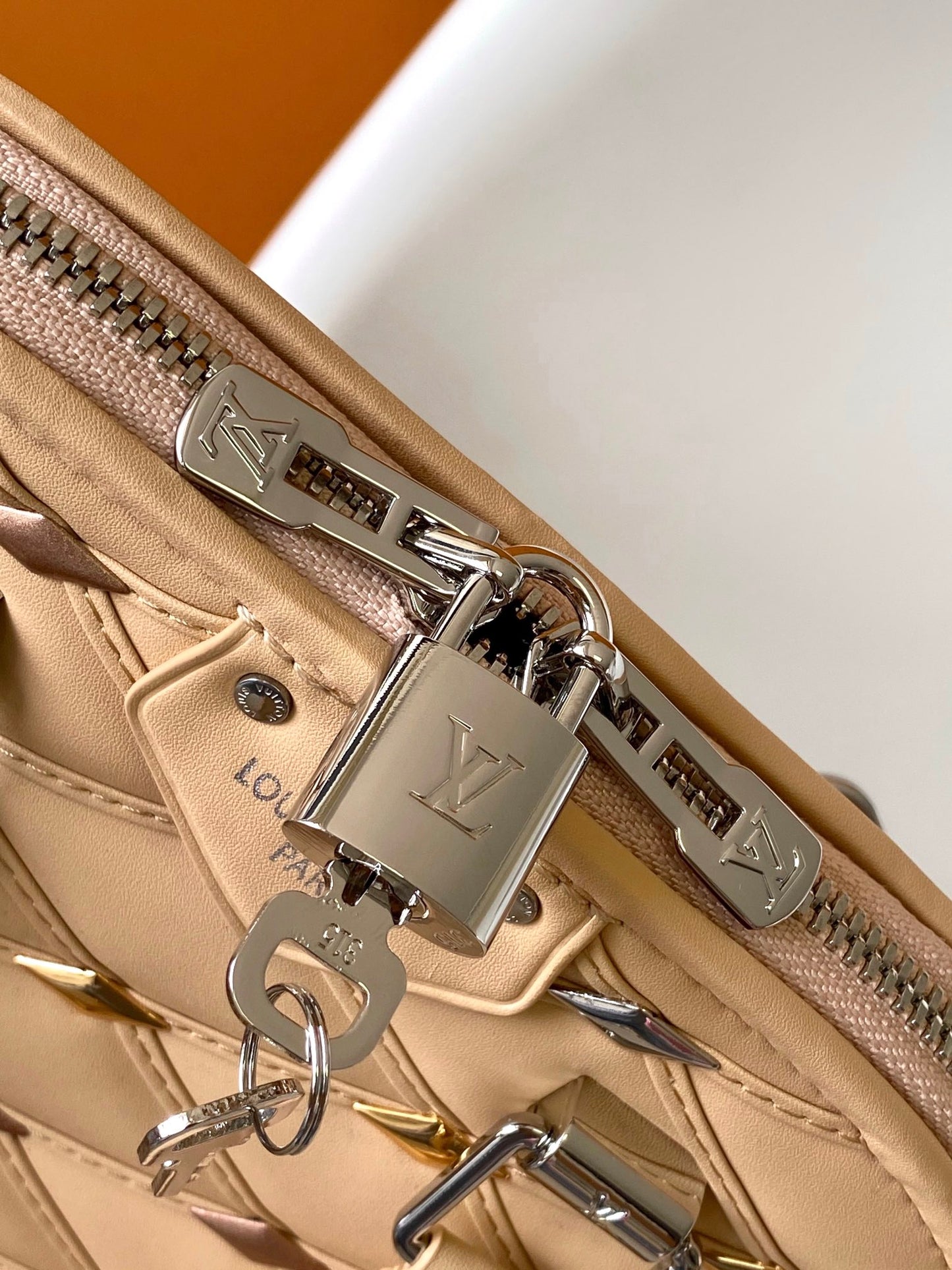 Quilted Leather Dome Top Handle Bag with Studs - Beige