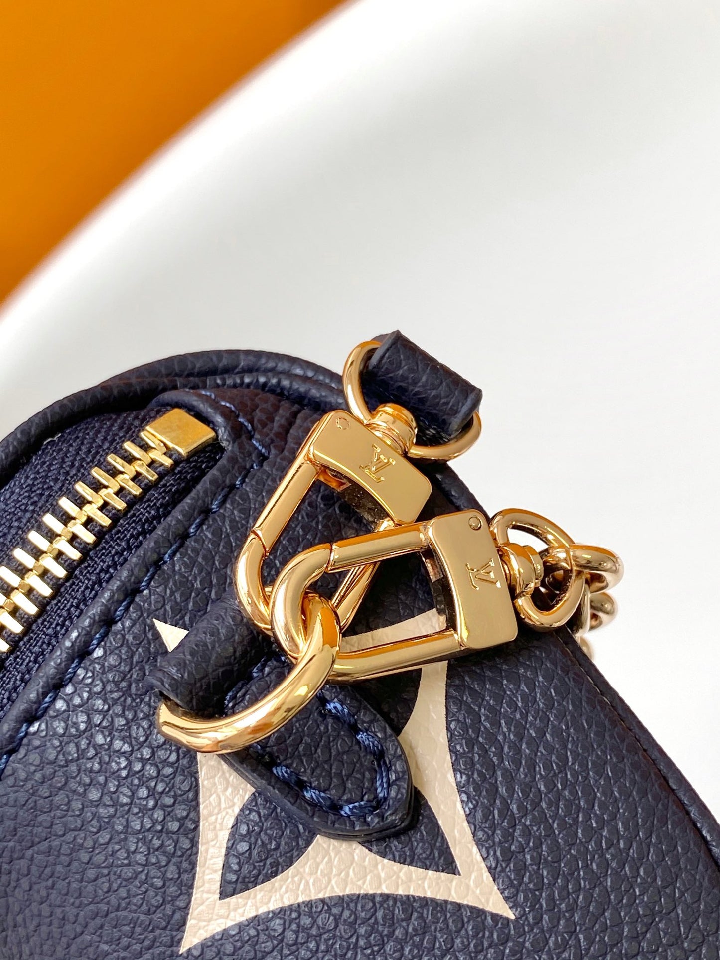 Louis Vuitton Navy Blue Leather Belt Bag with Gold Chain Strap and Floral Design