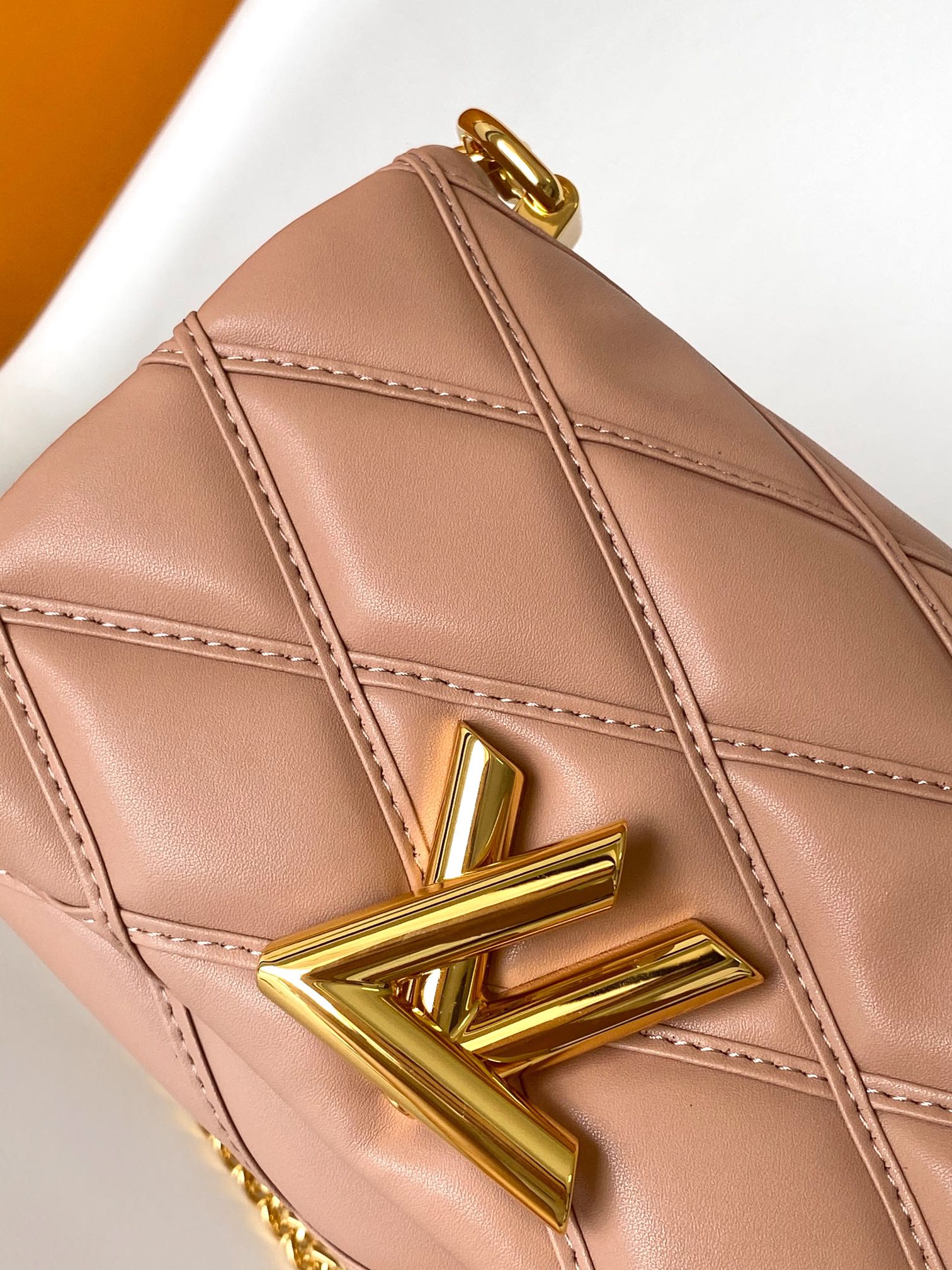 Louis Vuitton Elegant Blush Pink Quilted Leather Shoulder Bag with Gold Chain
