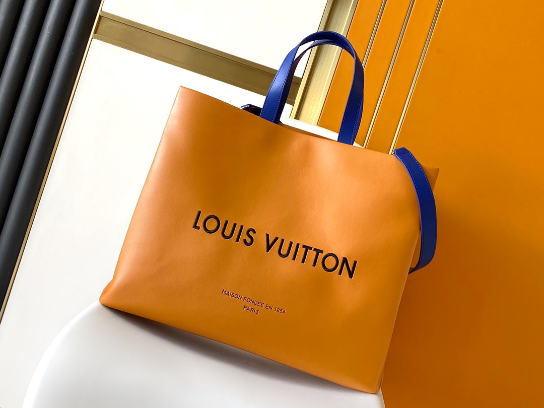 Authentic Louis Vuitton Orange Paper Shopping Bag with Blue Handles