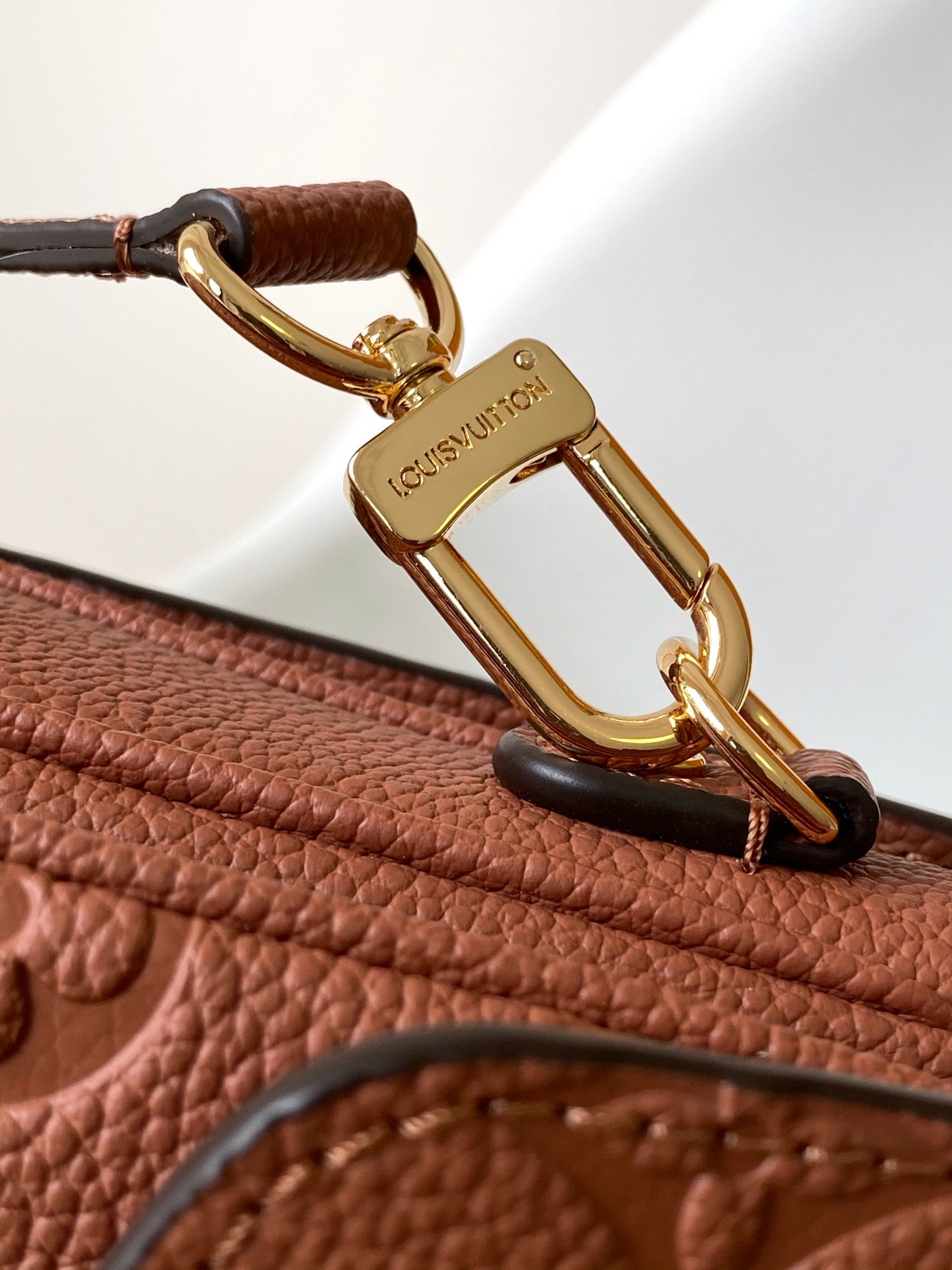Louis Vuitton Pochette Métis Monogram Empreinte Leather Cognac Handbag