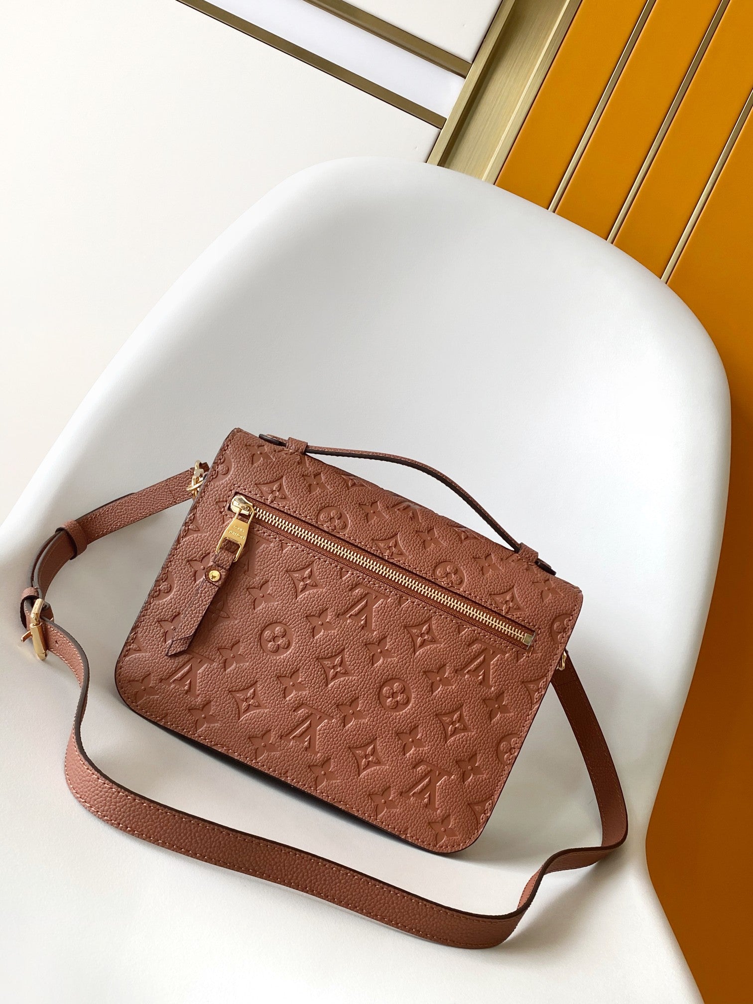 Louis Vuitton Pochette Métis Monogram Empreinte Leather Cognac Handbag