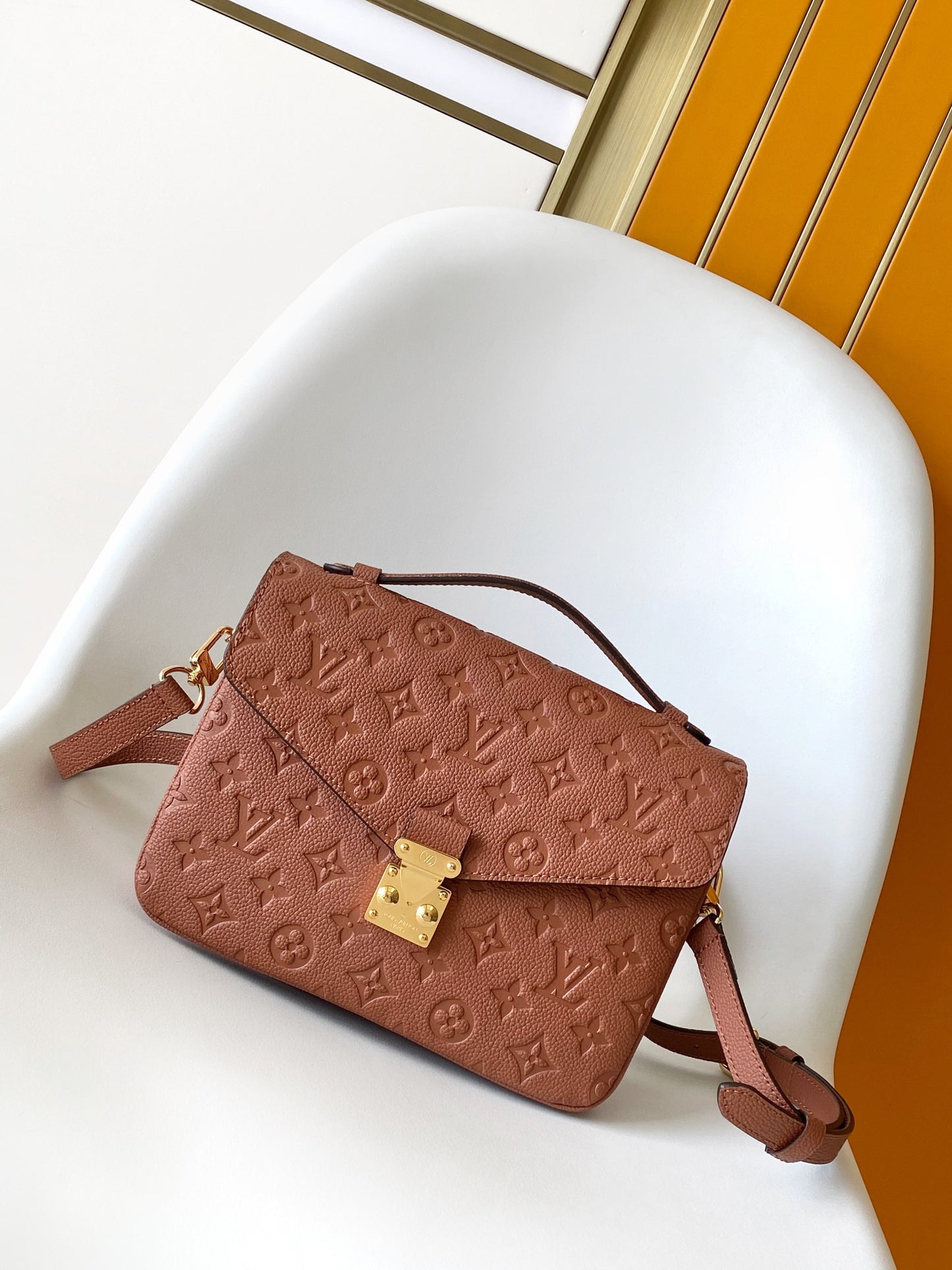 Louis Vuitton Pochette Métis Monogram Empreinte Leather Cognac Handbag