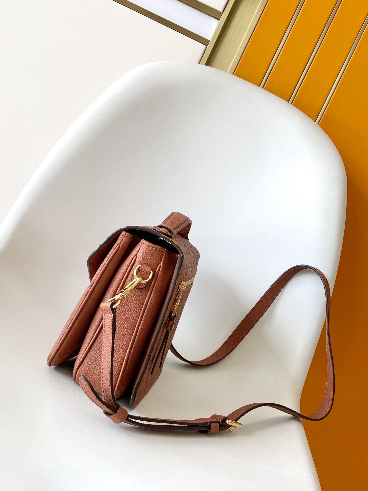 Louis Vuitton Pochette Métis Monogram Empreinte Leather Cognac Handbag