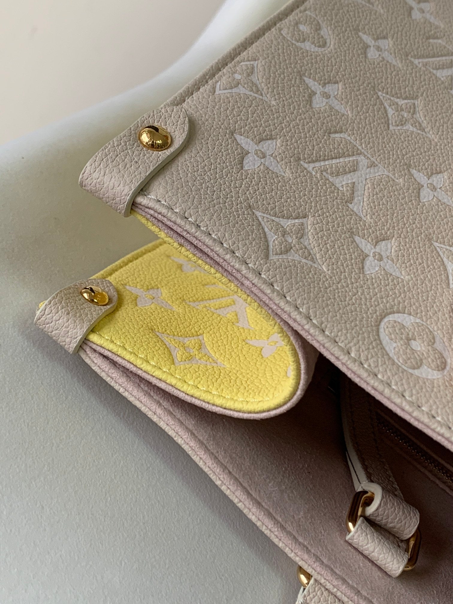 Louis Vuitton OnTheGo MM Monogram Empreinte Leather Tote Bag - Pink