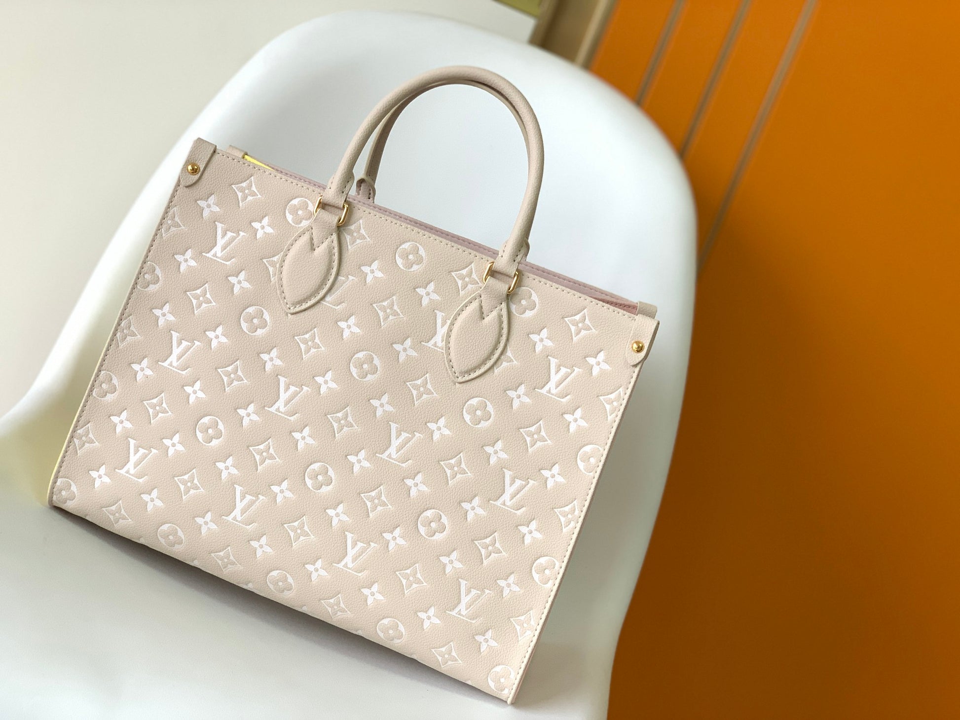 Louis Vuitton OnTheGo MM Monogram Empreinte Leather Tote Bag - Pink
