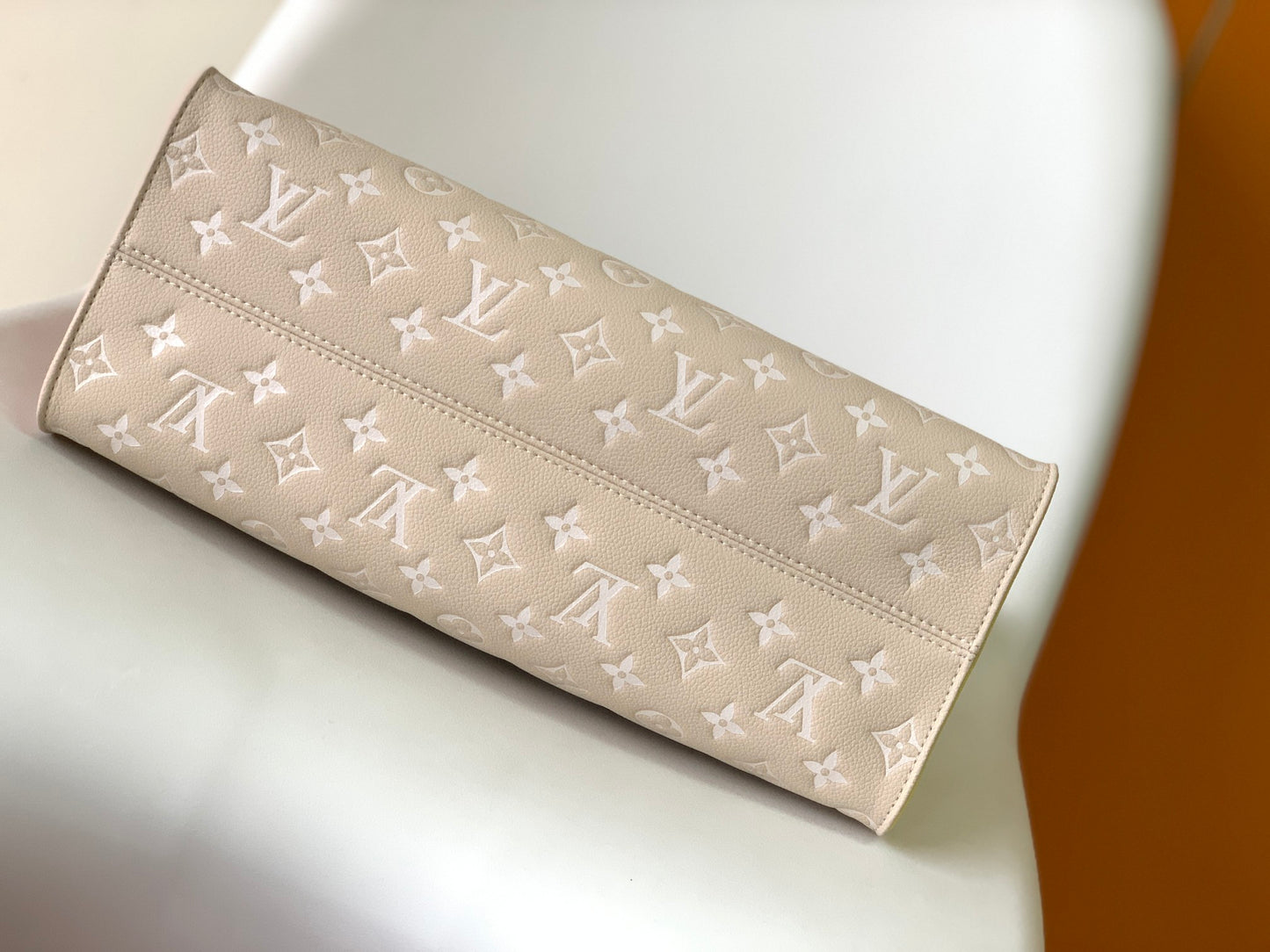 Louis Vuitton OnTheGo MM Monogram Empreinte Leather Tote Bag - Pink