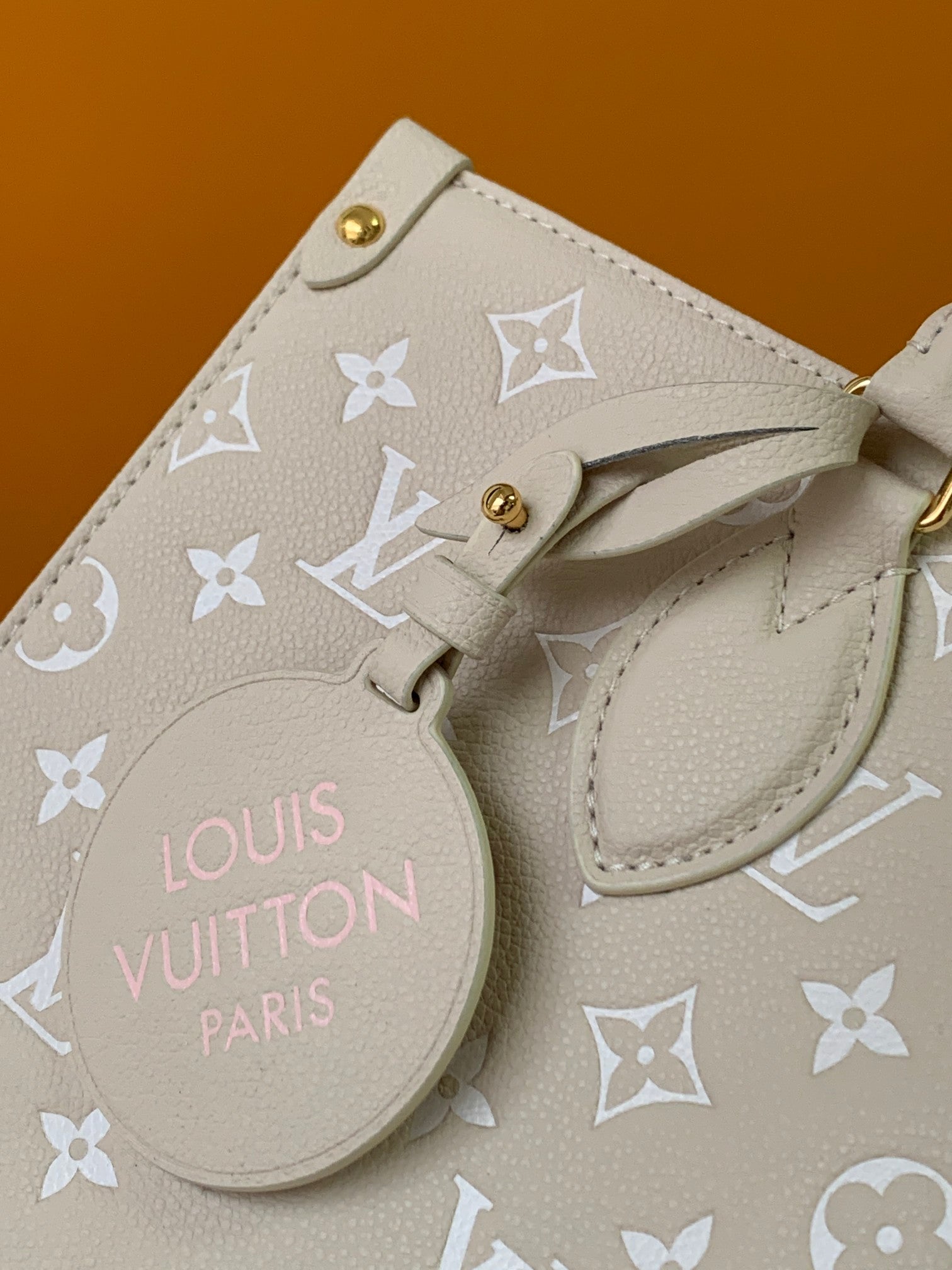 Louis Vuitton OnTheGo MM Monogram Empreinte Leather Tote Bag - Pink