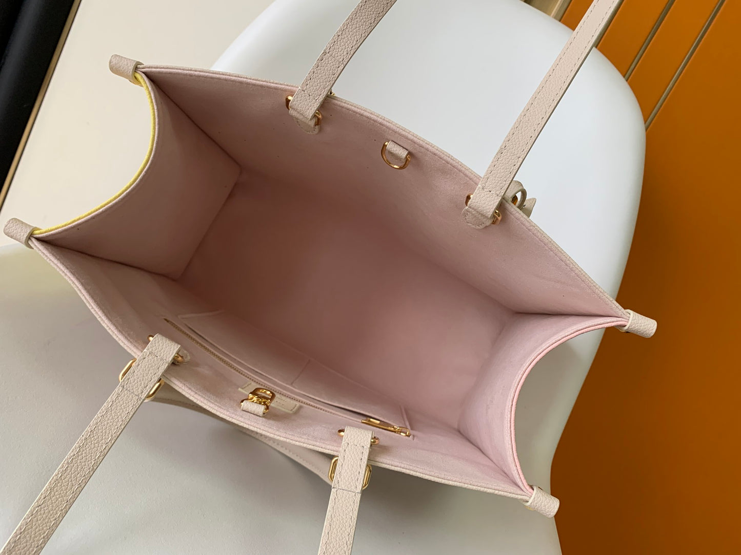Louis Vuitton OnTheGo MM Monogram Empreinte Leather Tote Bag - Pink
