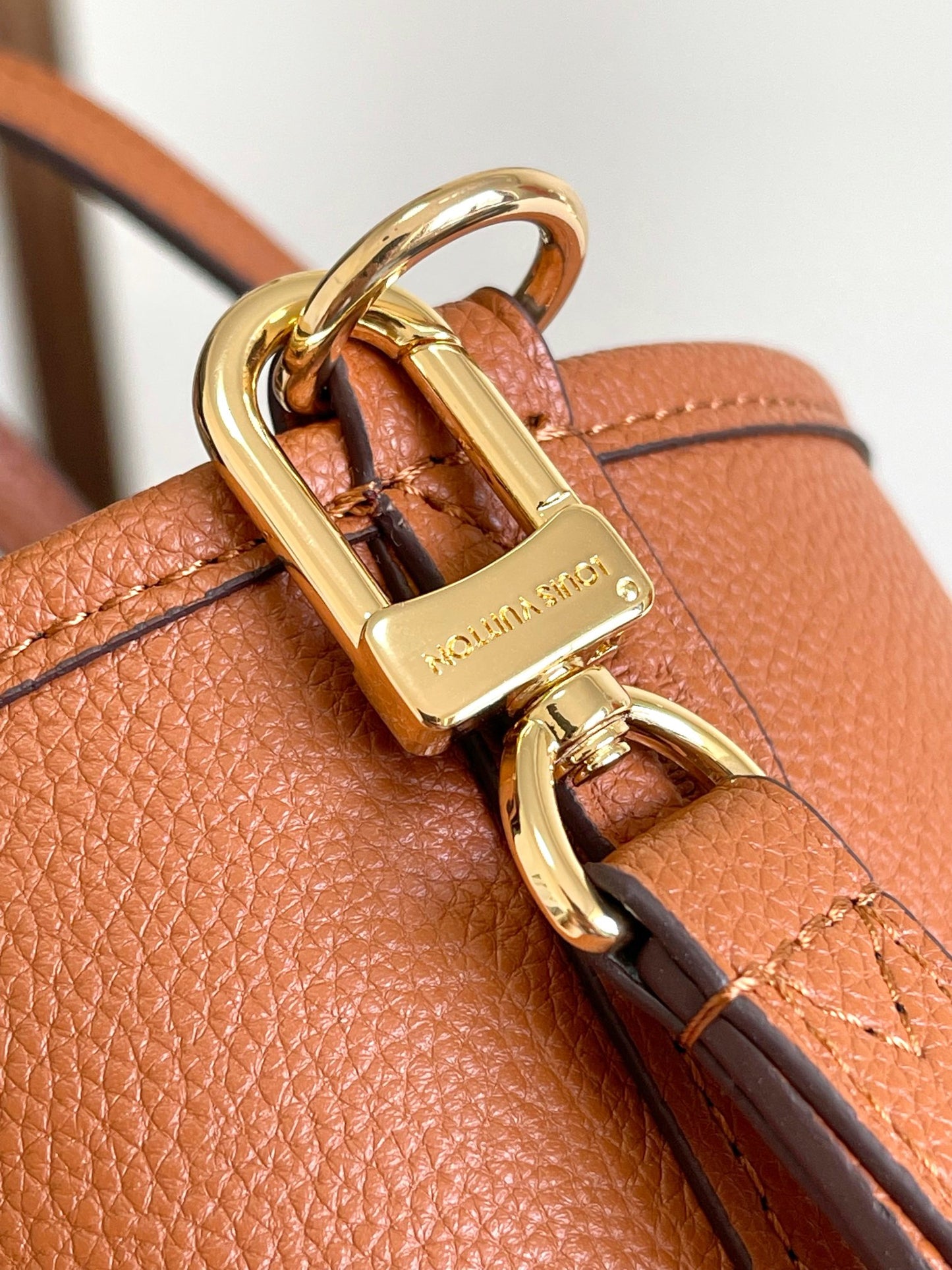 Brown Heart Embossed Bucket Handbag with Crossbody Strap and Cardholder