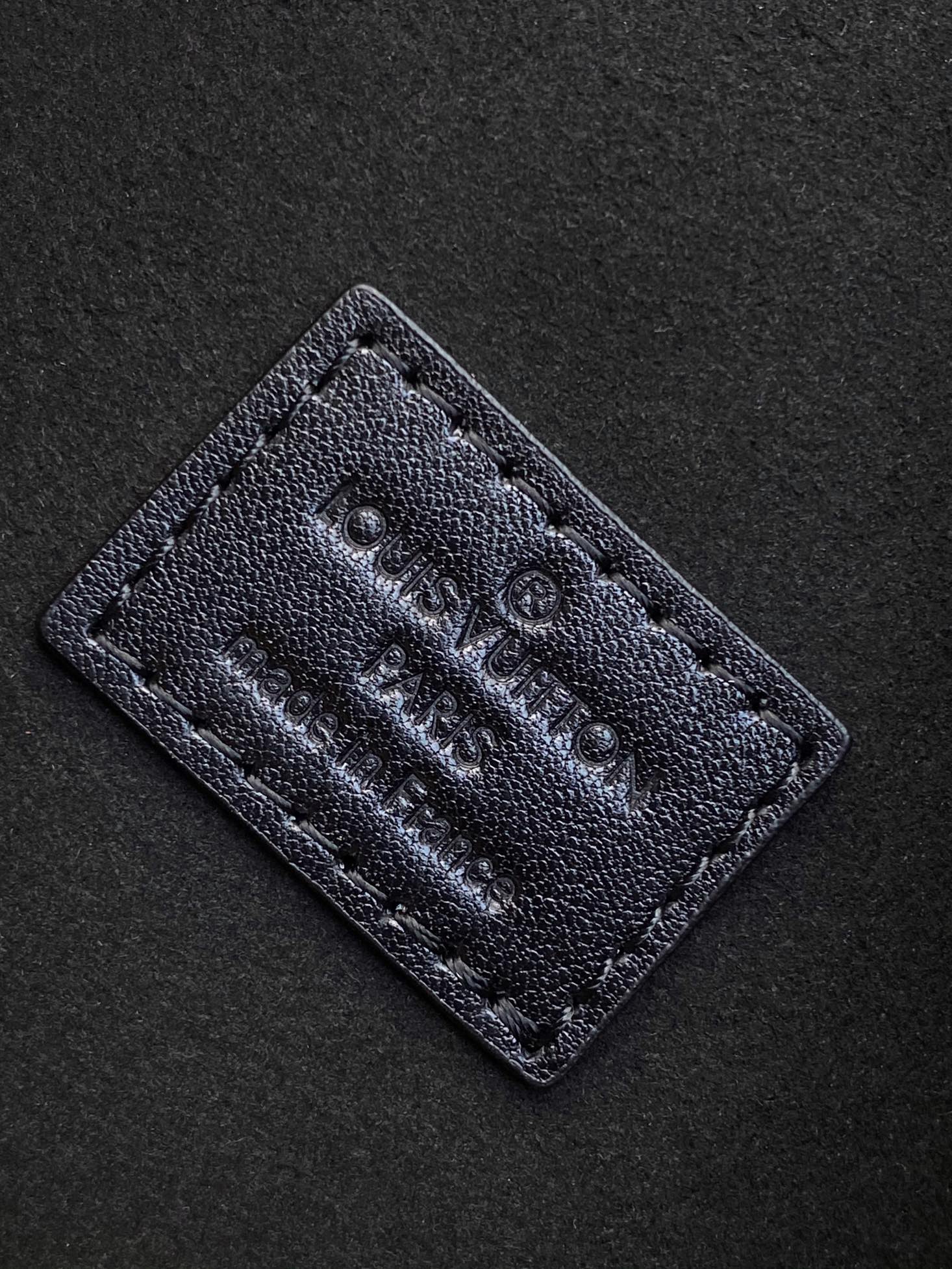 Louis Vuitton Elegant Black Underarm Shoulder Bag with Stud and Strap Details