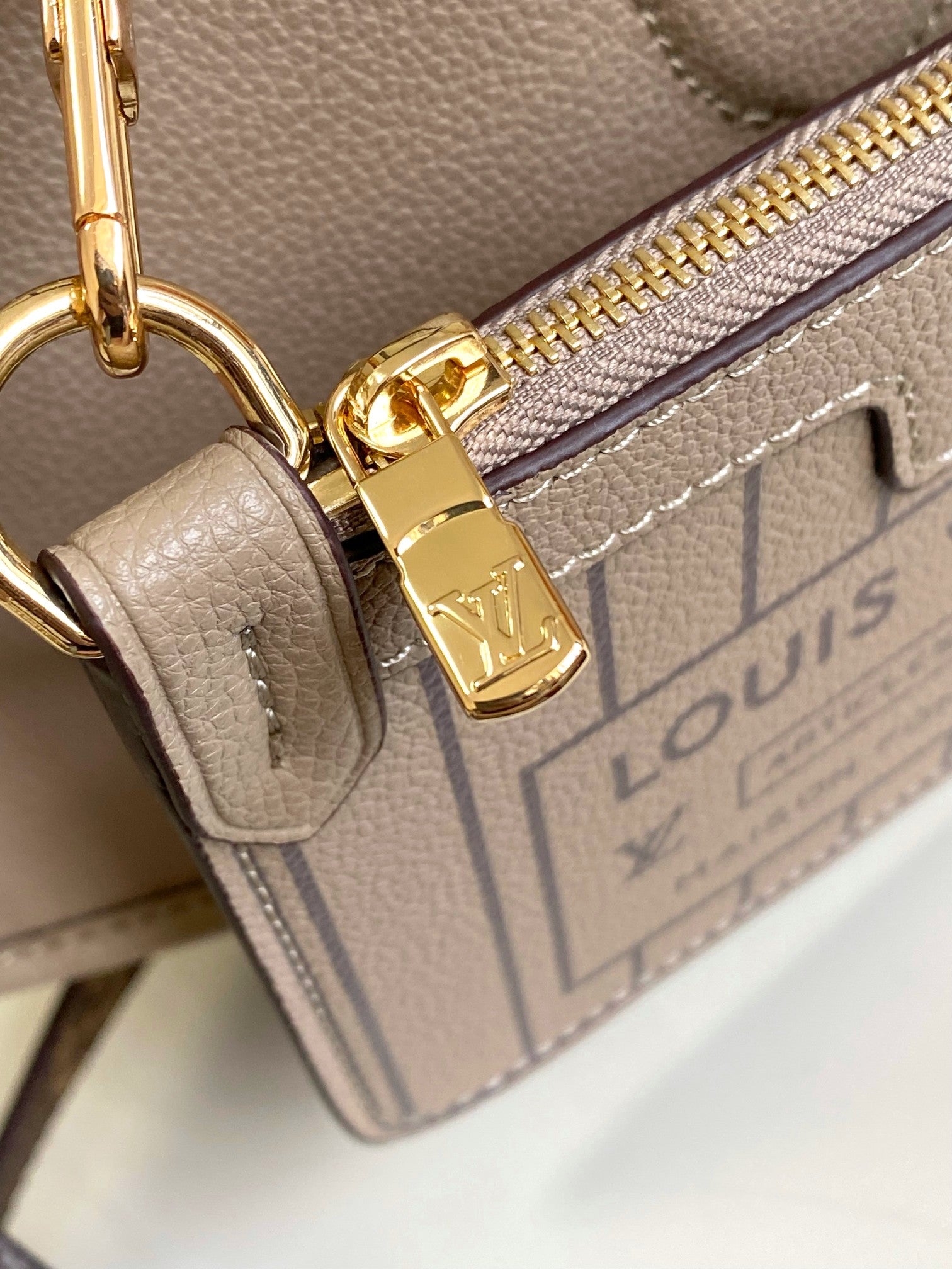 Louis Vuitton Lockme Bucket Bag - Taupe Grained Calfskin with Monogram Strap