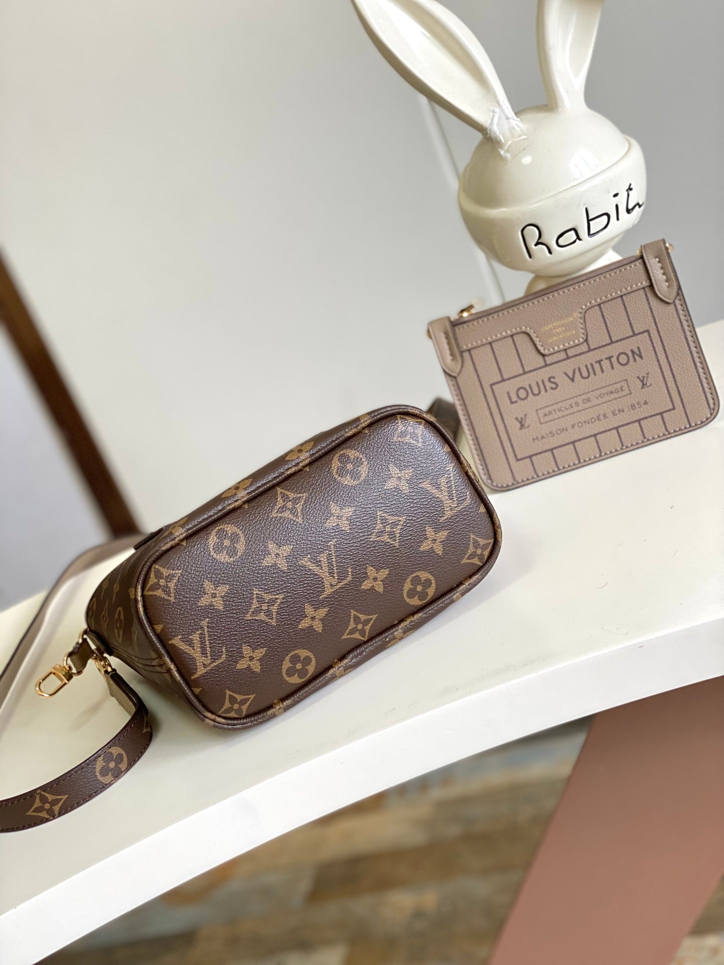 Louis Vuitton Classic Taupe Leather Bucket Bag with Top Handle and Strap